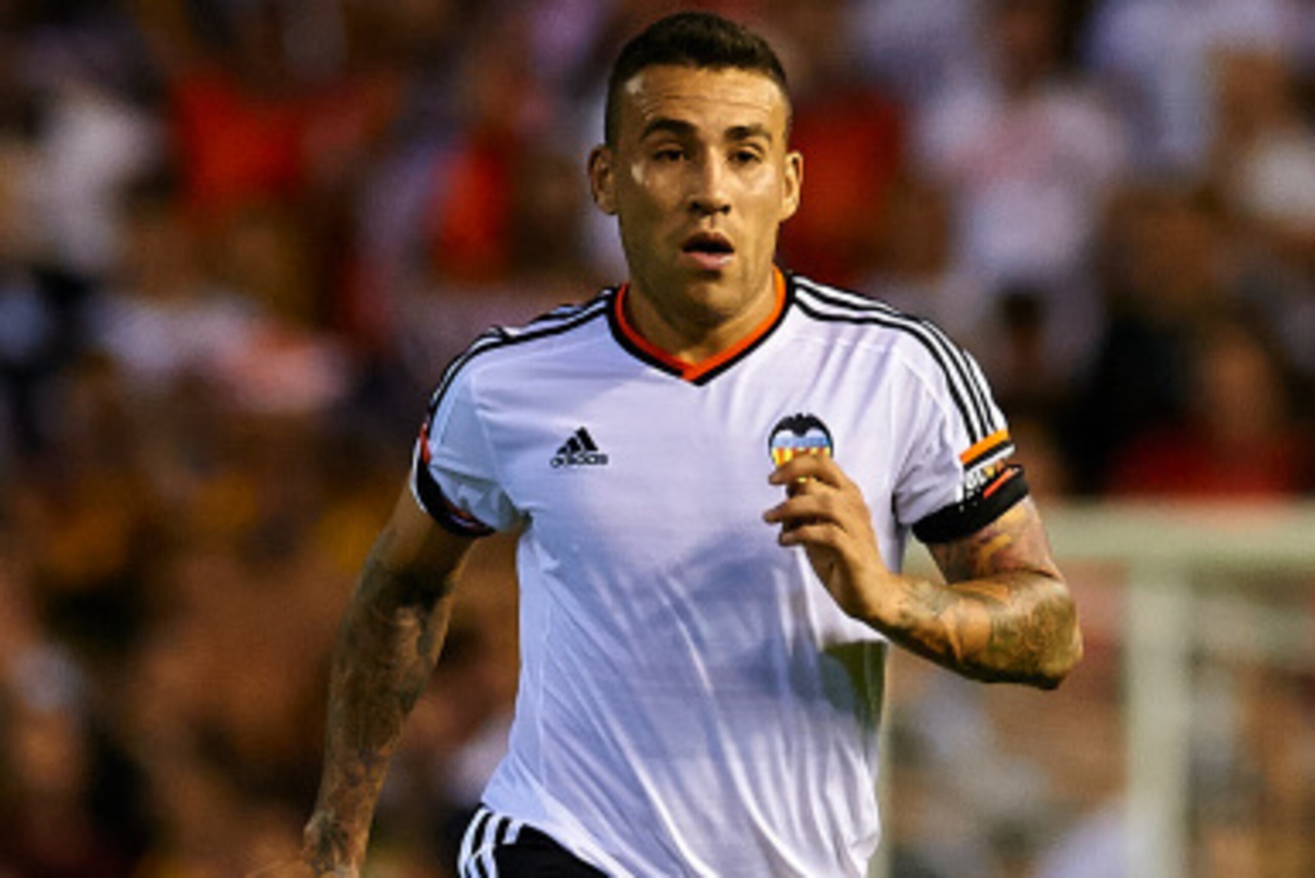 VALENCIA, SPAIN - AUGUST 29:  Nicolas Otamendi of Valencia runs with the ball during the La Liga match between Valencia CF and Malaga CF at Estadi de Mestalla on August 29, 2014 in Valencia, Spain.  (Photo by Manuel Queimadelos Alonso/Getty Images)