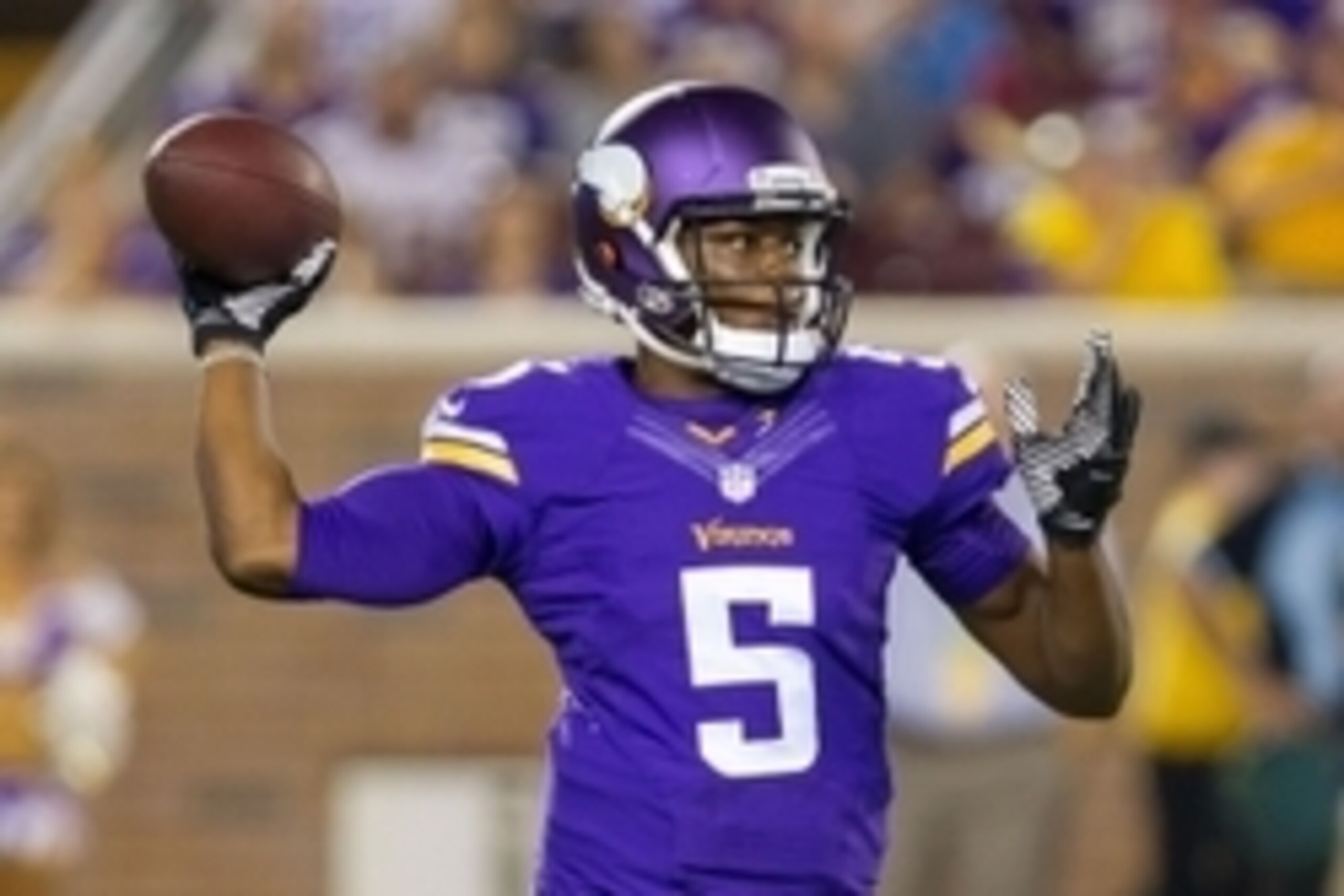 Aug 16, 2014; Minneapolis, MN, USA; Minnesota Vikings quarterback Teddy Bridgewater (5) passes the ball in the fourth quarter against the Arizona Cardinals at TCF Bank Stadium. The Vikings won 30-28. Mandatory Credit: Brad Rempel-USA TODAY Sports