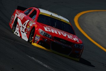 LOUDON, NH - SEPTEMBER 19:  Kevin Harvick, driver of the #4 Budweiser Designate a Driver Chevrolet, practices for the NASCAR Sprint Cup Series Sylvania 300 at New Hampshire Motor Speedway on September 19, 2014 in Loudon, New Hampshire.  (Photo by Chris Tr