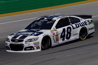 SPARTA, KY - JUNE 27:  Jimmie Johnson, driver of the #48 Lowe's Chevrolet, practices for the NASCAR Sprint Cup Series Quaker State 400 presented by Advance Auto Parts at Kentucky Speedway on June 27, 2014 in Sparta, Kentucky.  (Photo by Todd Warshaw/Getty