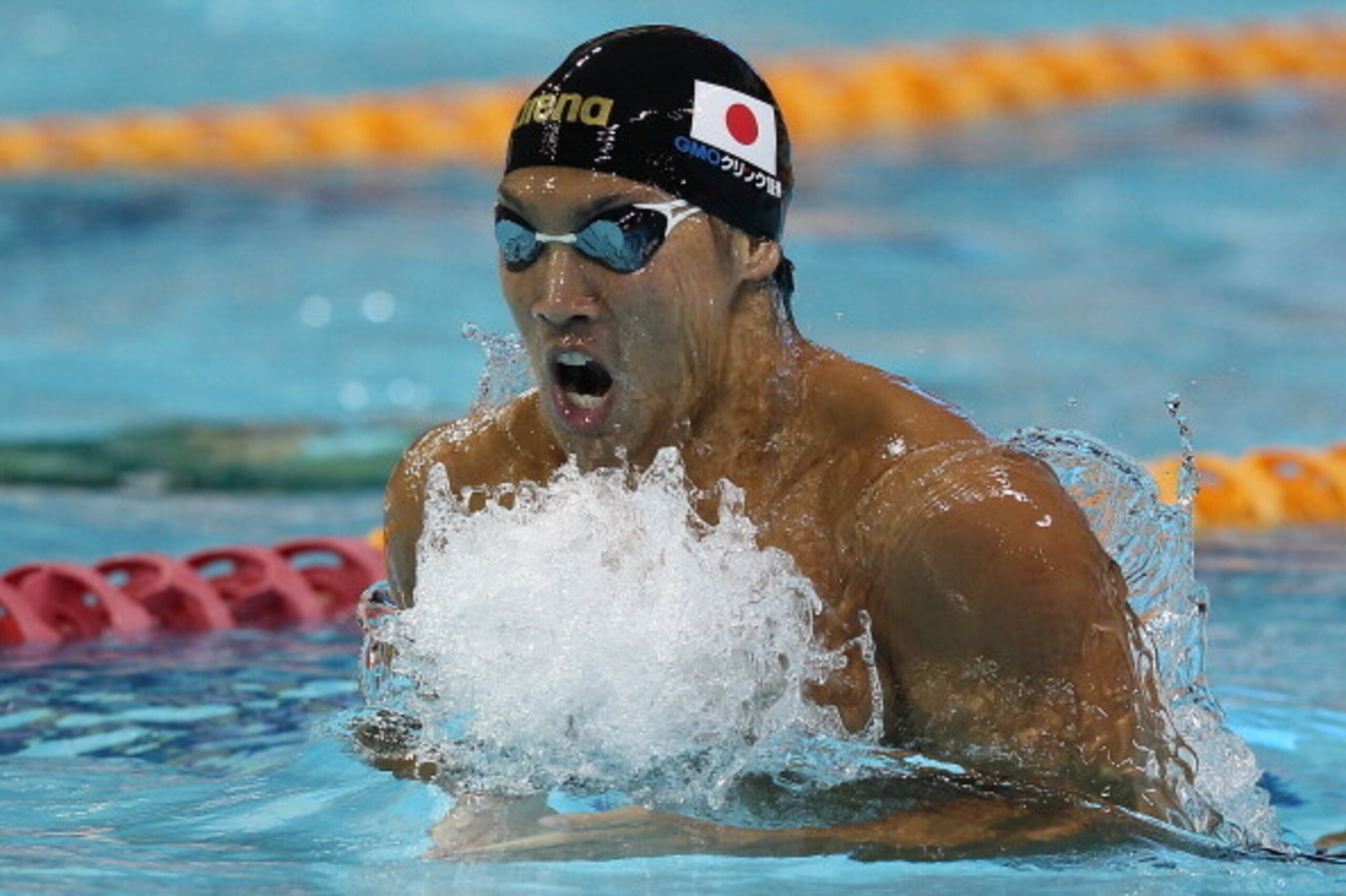 SINGAPORE - NOVEMBER 04:  Naoya Tomita of Japan competes in the men's 200m Breaststroke final during day one of the 2011 FINA World Cup at Singapore Sports School on November 4, 2011 in Singapore.  (Photo by Chris McGrath/Getty Images)