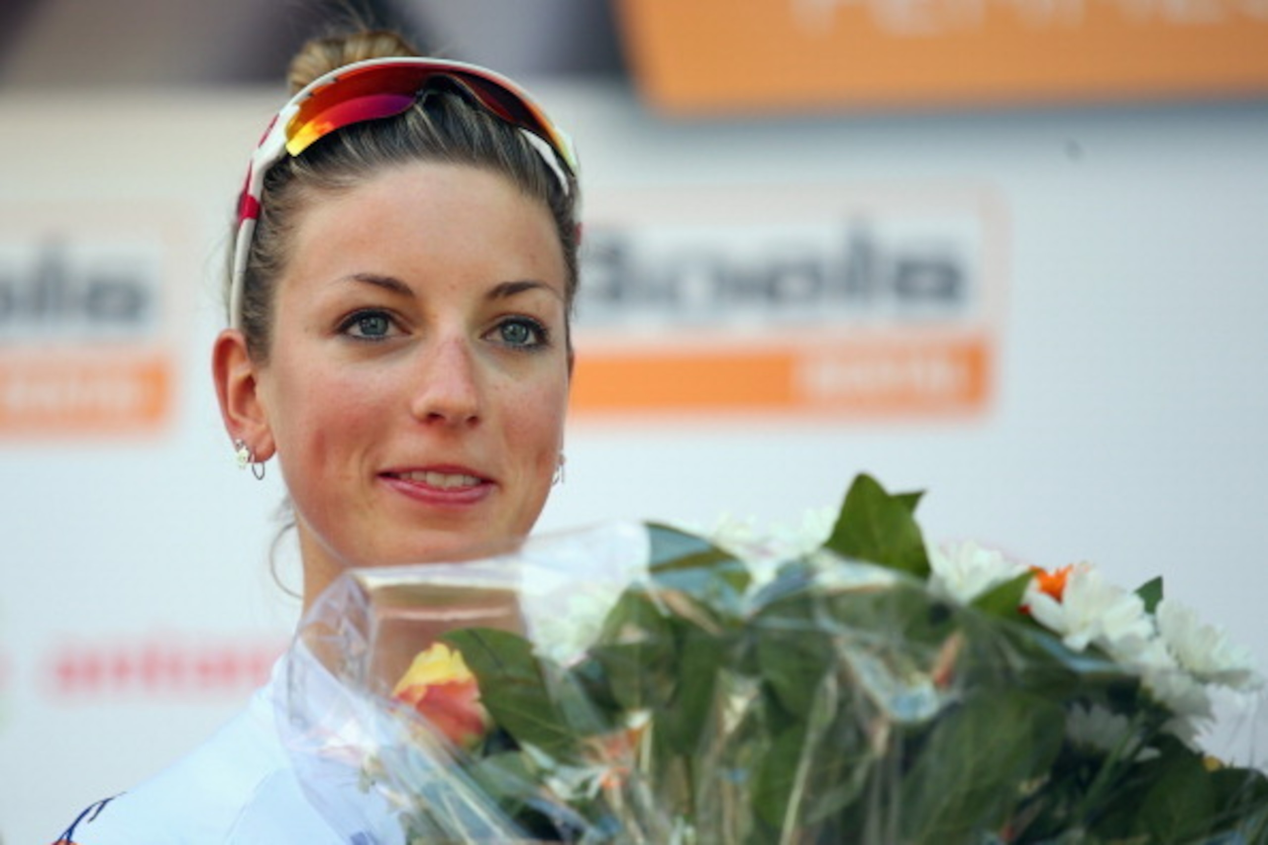 HUY, BELGIUM - APRIL 23:  Race winner Pauline Ferrand-Prevot of France and Rabobank-Liv stands on the podium after the 17th edition of the La Fleche Wallonne Feminine on April 23, 2014 in Huy, Belgium. Part of the UCI Women's Road Cycling World Cup, the 1