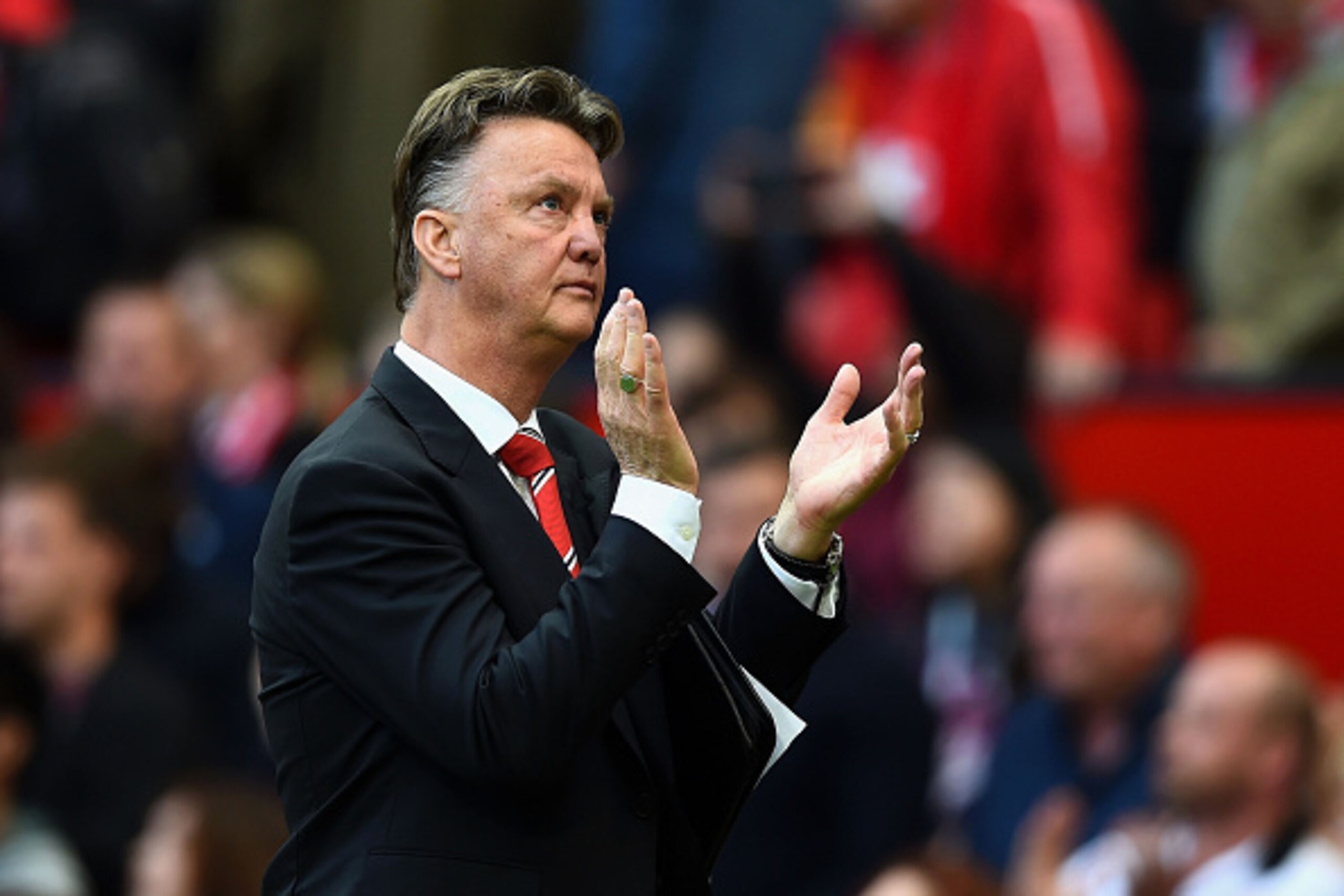 MANCHESTER, ENGLAND - SEPTEMBER 27: Louis van Gaal the manager of Manchester United applauds the fans following his team's 2-1 victory during the Barclays Premier League match between Manchester United and West Ham United at Old Trafford on September 27, MANCHESTER, ENGLAND - SEPTEMBER 27: Louis van Gaal the manager of Manchester United applauds the fans following his team's 2-1 victory during the Barclays Premier League match between Manchester United and West Ham United at Old Trafford on September 27,