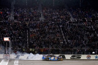 FORT WORTH, TX - APRIL 04:  Chase Elliott, driver of the #9 NAPA Auto Parts Chevrolet, celebrates with a burnout after winning the NASCAR Nationwide Series O'Reilly Auto Parts 300 at Texas Motor Speedway on April 4, 2014 in Fort Worth, Texas.  (Photo by S