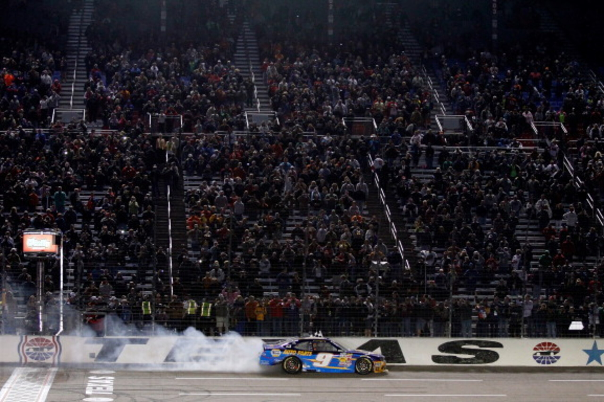 FORT WORTH, TX - APRIL 04:  Chase Elliott, driver of the #9 NAPA Auto Parts Chevrolet, celebrates with a burnout after winning the NASCAR Nationwide Series O'Reilly Auto Parts 300 at Texas Motor Speedway on April 4, 2014 in Fort Worth, Texas.  (Photo by S
