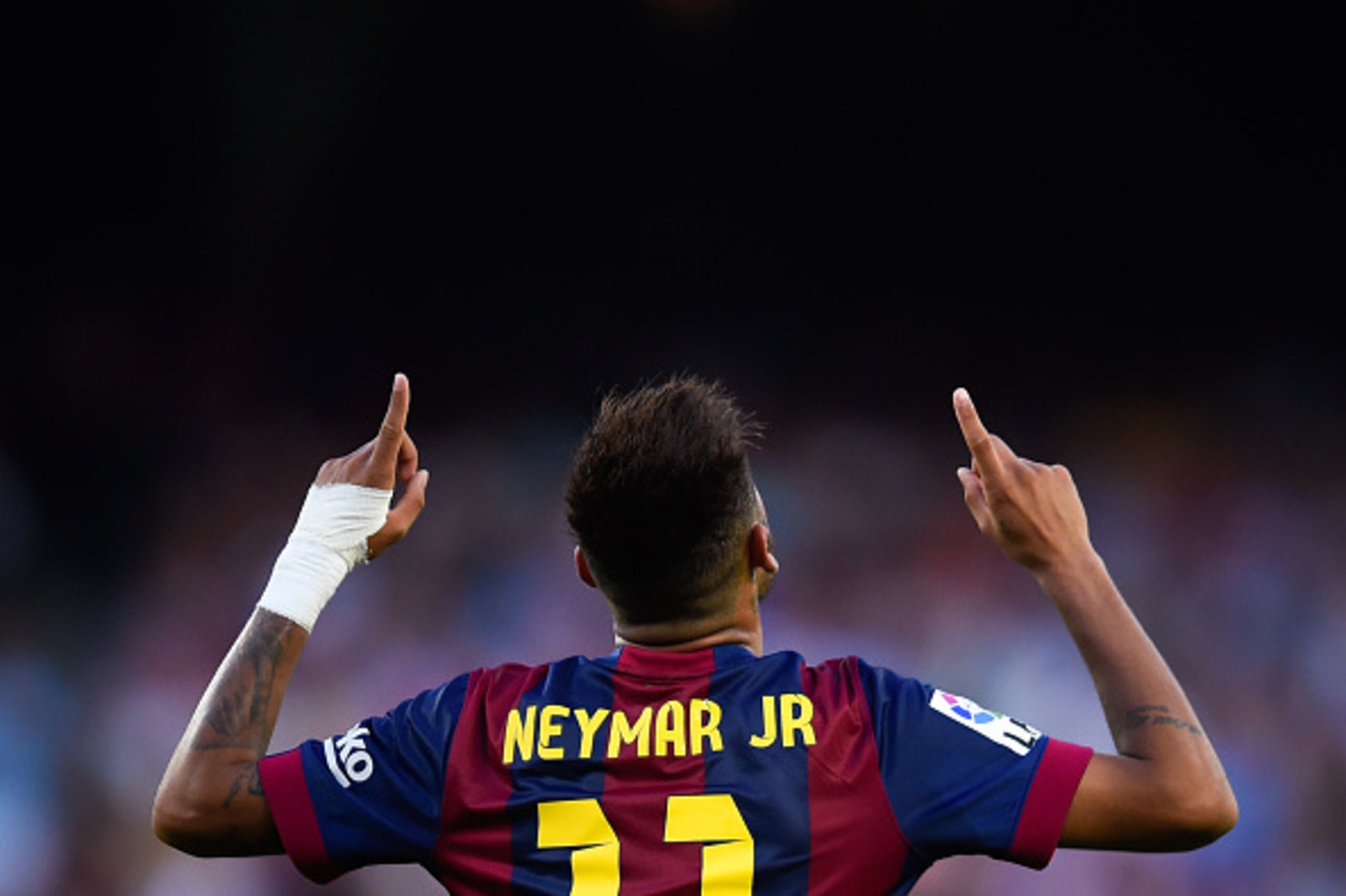 BARCELONA, SPAIN - SEPTEMBER 27:  Neymar of FC Barcelona celebrates after scoring his team's fifth goal during the La Liga match between FC Barcelona and Granada CF at Camp Nou on September 27, 2014 in Barcelona, Spain.  (Photo by David Ramos/Getty Images