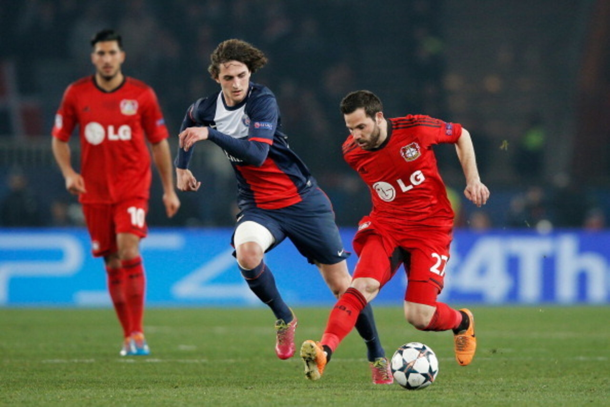 PARIS, FRANCE - MARCH 12:  Gonzalo Castro of Bayer Leverkusen takes on Adrien Rabiot of Paris Saint-Germain during the UEFA Champions League Round of 16 second leg match between Paris Saint-Germain FC and Bayer Leverkusen at Parc des Princes on March 12, 