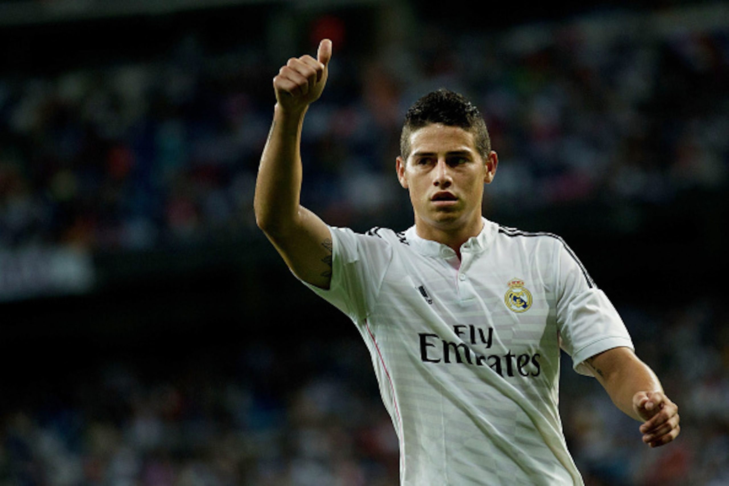 MADRID, SPAIN - SEPTEMBER 23:  James Rodriguez of Real Madrid CF gives the ok to his teammates during the La Liga match between Real Madrid CF and Elche CF at Estadio Santiago Bernabeu on September 23, 2014 in Madrid, Spain.  (Photo by Gonzalo Arroyo More