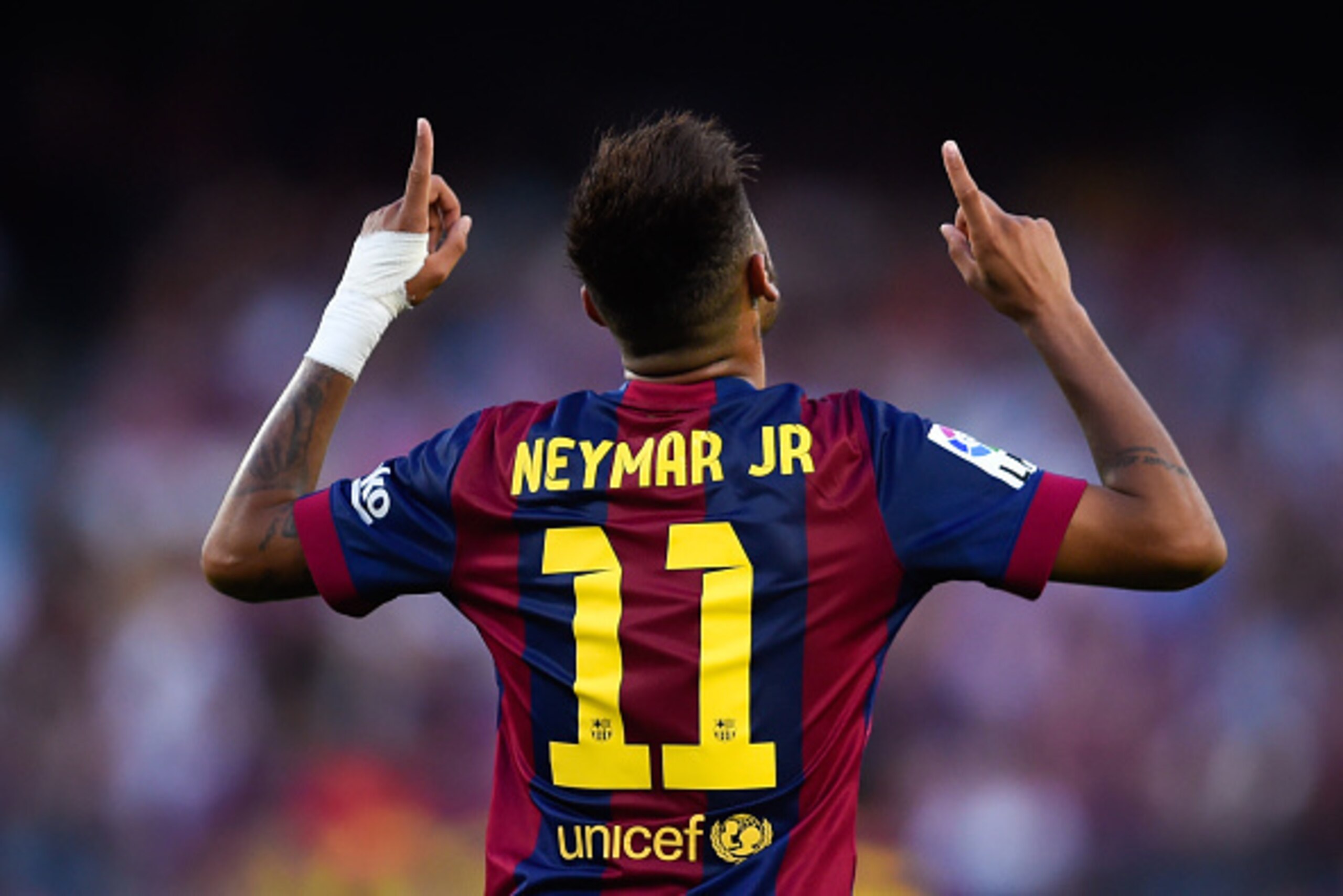 BARCELONA, SPAIN - SEPTEMBER 27:  Neymar of FC Barcelona celebrates after scoring his team's fifth goal during the La Liga match between FC Barcelona and Granada CF at Camp Nou on September 27, 2014 in Barcelona, Spain.  (Photo by David Ramos/Getty Images