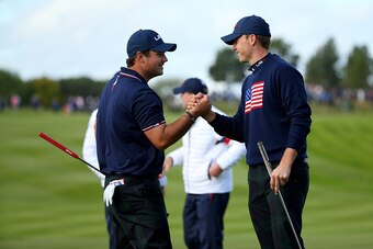 AUCHTERARDER, SCOTLAND - SEPTEMBER 27:  Patrick Reed (L) and Jordan Spieth of the United States celebrate victory on the 15th hole during the Morning Fourballs of the 2014 Ryder Cup on the PGA Centenary course at the Gleneagles Hotel on September 27, 2014