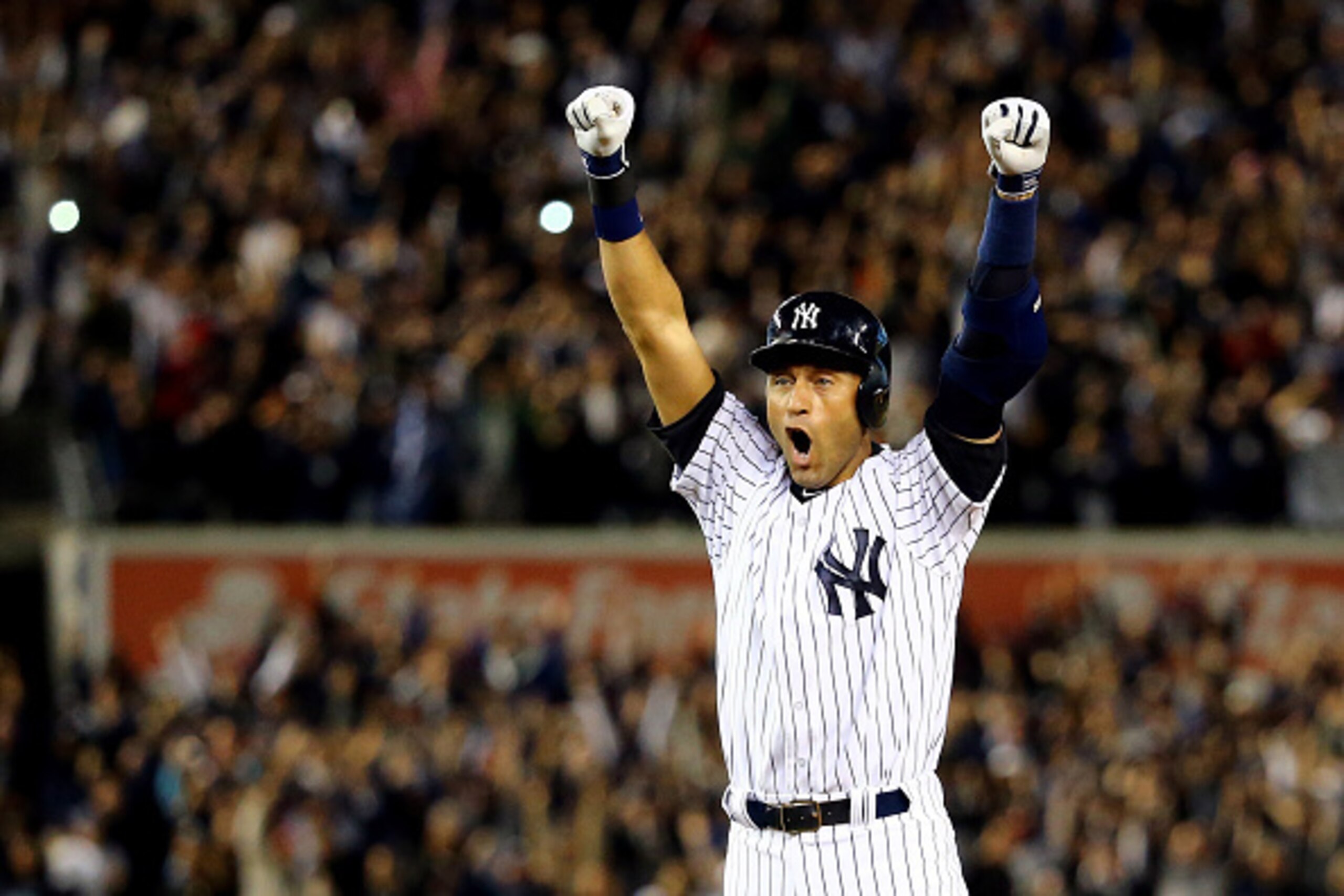 NEW YORK, NY - SEPTEMBER 25:  Derek Jeter #2 of the New York Yankees celebrates after a game winning RBI hit in the ninth inning against the Baltimore Orioles in his last game ever at Yankee Stadium on September 25, 2014 in the Bronx borough of New York C
