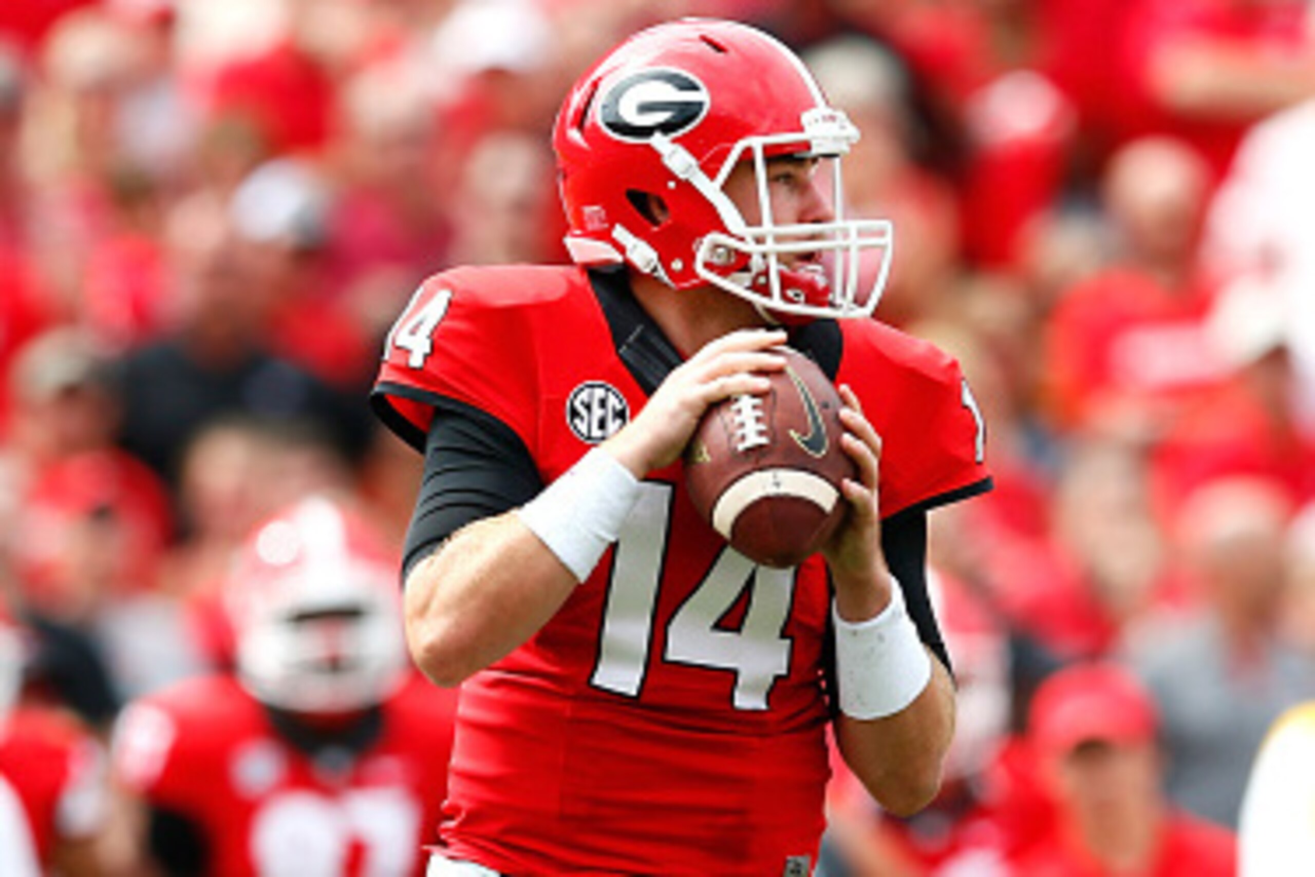 ATHENS, GA - SEPTEMBER 27:  Hutson Mason #14 of the Georgia Bulldogs looks to pass against the Tennessee Volunteers at Sanford Stadium on September 27, 2014 in Athens, Georgia.  (Photo by Kevin C. Cox/Getty Images)
