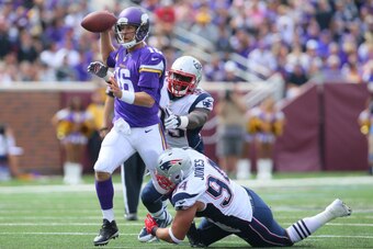MINNEAPOLIS, MN - SEPTEMBER 14:  Chandler Jones #95 and Chris Jones #94 of the New England Patriots attempt to sack Matt Cassel #16 of the Minnesota Vikings  at TCF Bank Stadium on September 14, 2014 in Minneapolis, Minnesota.  (Photo by Adam Bettcher/Get