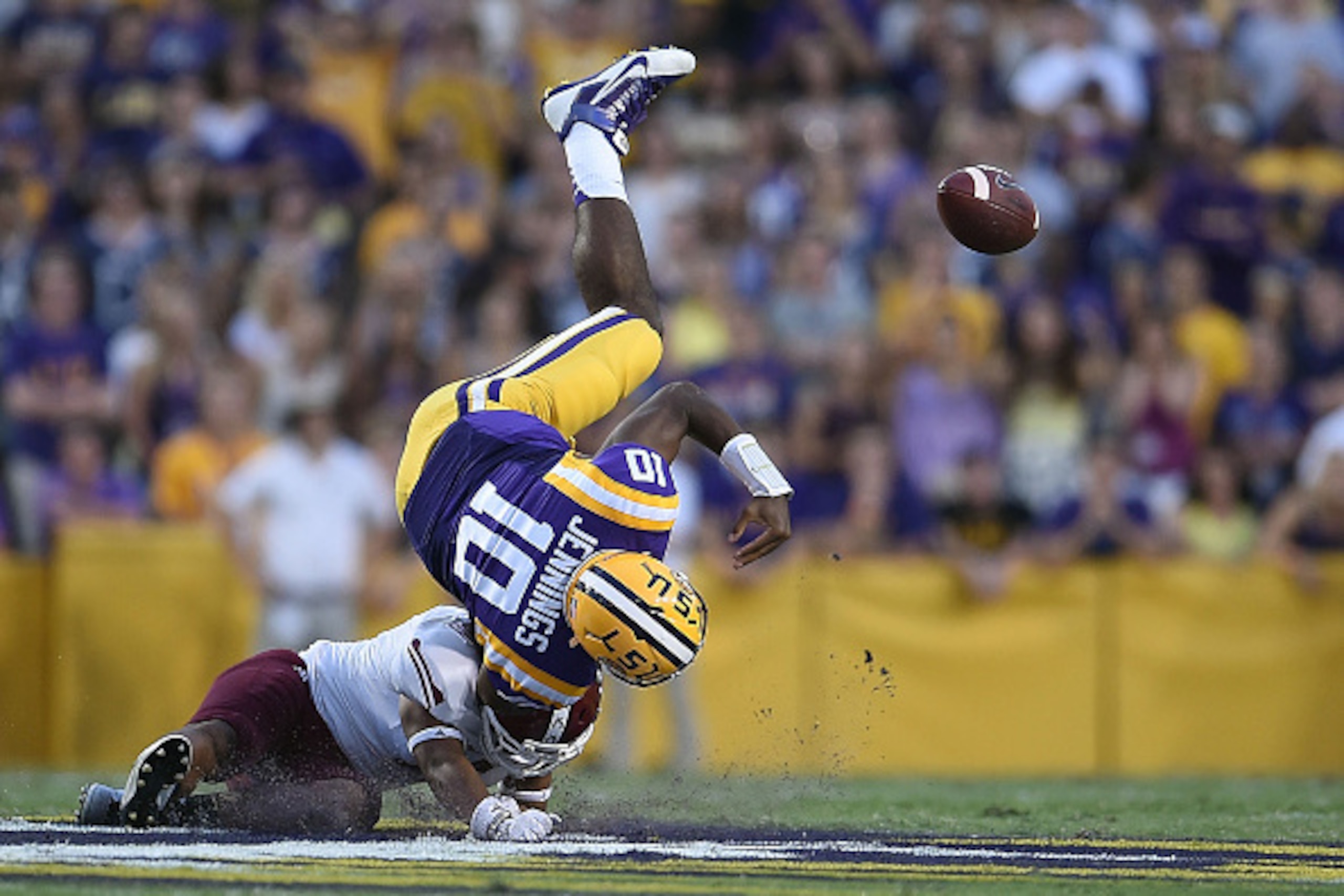 BATON ROUGE, LA - SEPTEMBER 27: Anthony Jennings #10 of the LSU Tigers fumbles the ball after being hit by Kawe Johnson #16 of the New Mexico State Aggies during the first quarter of a game at Tiger Stadium on September 27, 2014 in Baton Rouge, Louisiana BATON ROUGE, LA - SEPTEMBER 27: Anthony Jennings #10 of the LSU Tigers fumbles the ball after being hit by Kawe Johnson #16 of the New Mexico State Aggies during the first quarter of a game at Tiger Stadium on September 27, 2014 in Baton Rouge, Louisiana