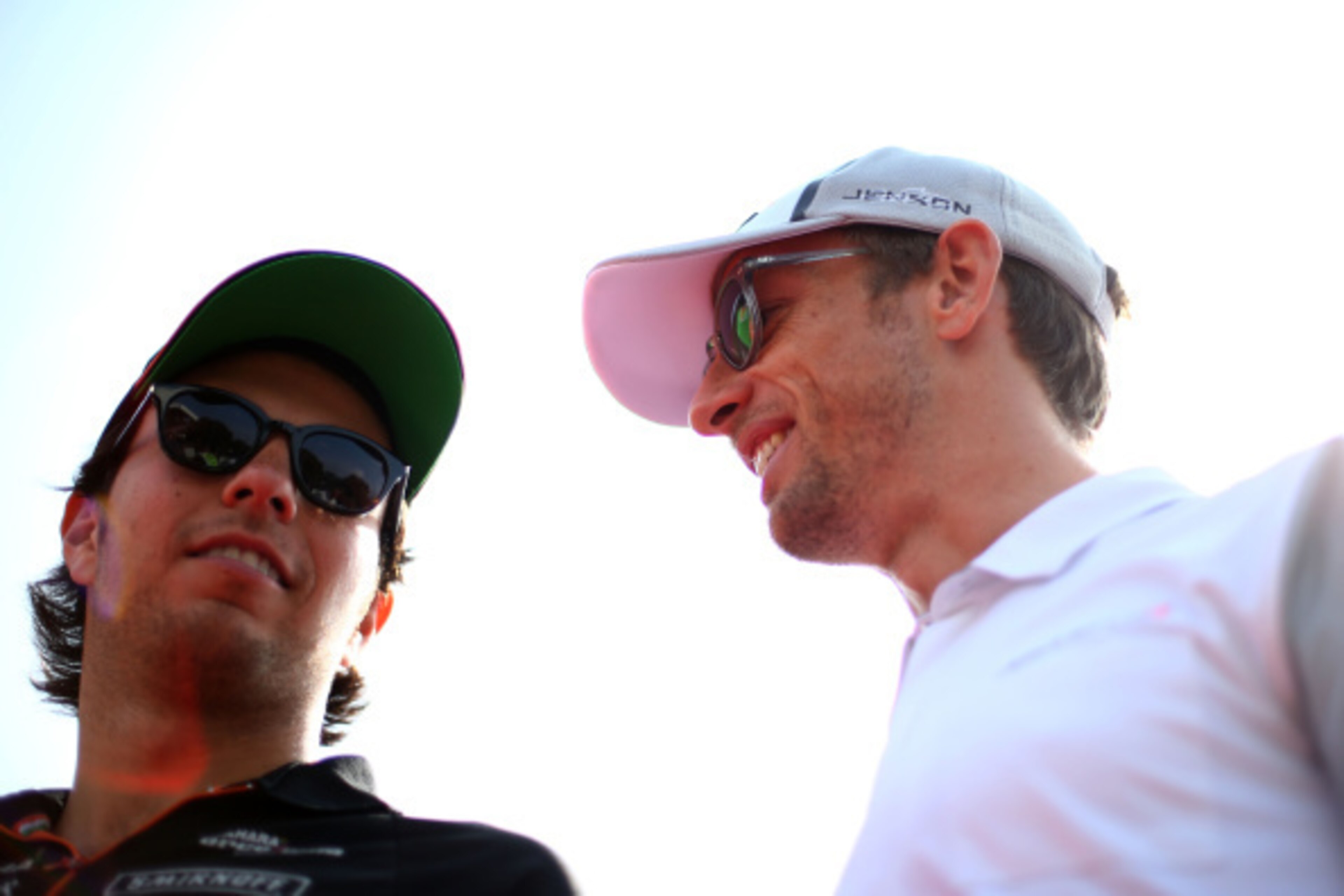 MONZA, ITALY - SEPTEMBER 07:  Sergio Perez of Mexico and Force India and Jenson Button of Great Britain and McLaren take part in the Drivers Parade prior to the F1 Grand Prix of Italy at Autodromo di Monza on September 7, 2014 in Monza, Italy.  (Photo by 