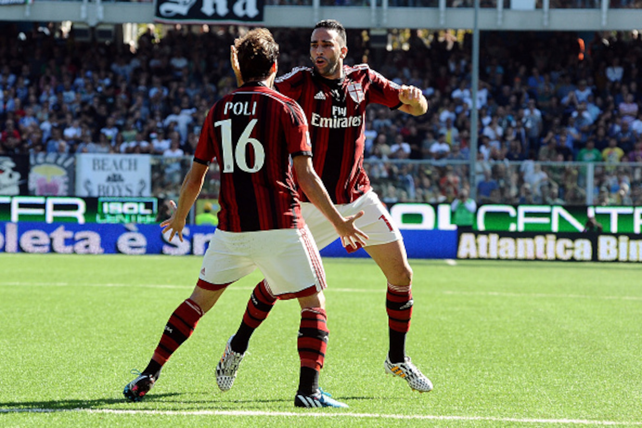 CESENA, ITALY - SEPTEMBER 28:  Adil Rami # 13 of AC Milan celebrates after scroing his team's first goal the Serie A match between AC Cesena and AC Milan at Dino Manuzzi Stadium on September 28, 2014 in Cesena, Italy.  (Photo by Mario Carlini / Iguana Pre