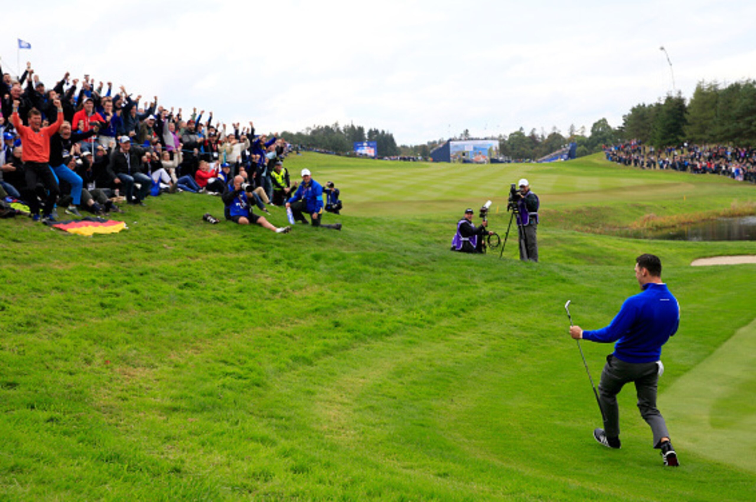 AUCHTERARDER, SCOTLAND - SEPTEMBER 28:  Martin Kaymer of Europe celebrates chipping in on the 16th hole to defeat Bubba Watson of the United States during the Singles Matches of the 2014 Ryder Cup on the PGA Centenary course at the Gleneagles Hotel on Sep