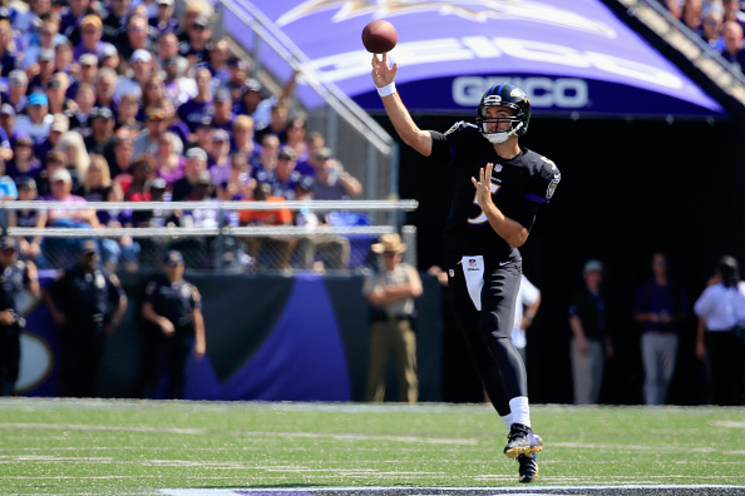 BALTIMORE, MD - SEPTEMBER 28: Quarterback Joe Flacco #5 of the Baltimore Ravens throws a pass during the first quarter of a game against the Carolina Panthers at M&T Bank Stadium on September 28, 2014 in Baltimore, Maryland.  (Photo by Rob Carr/Getty Imag