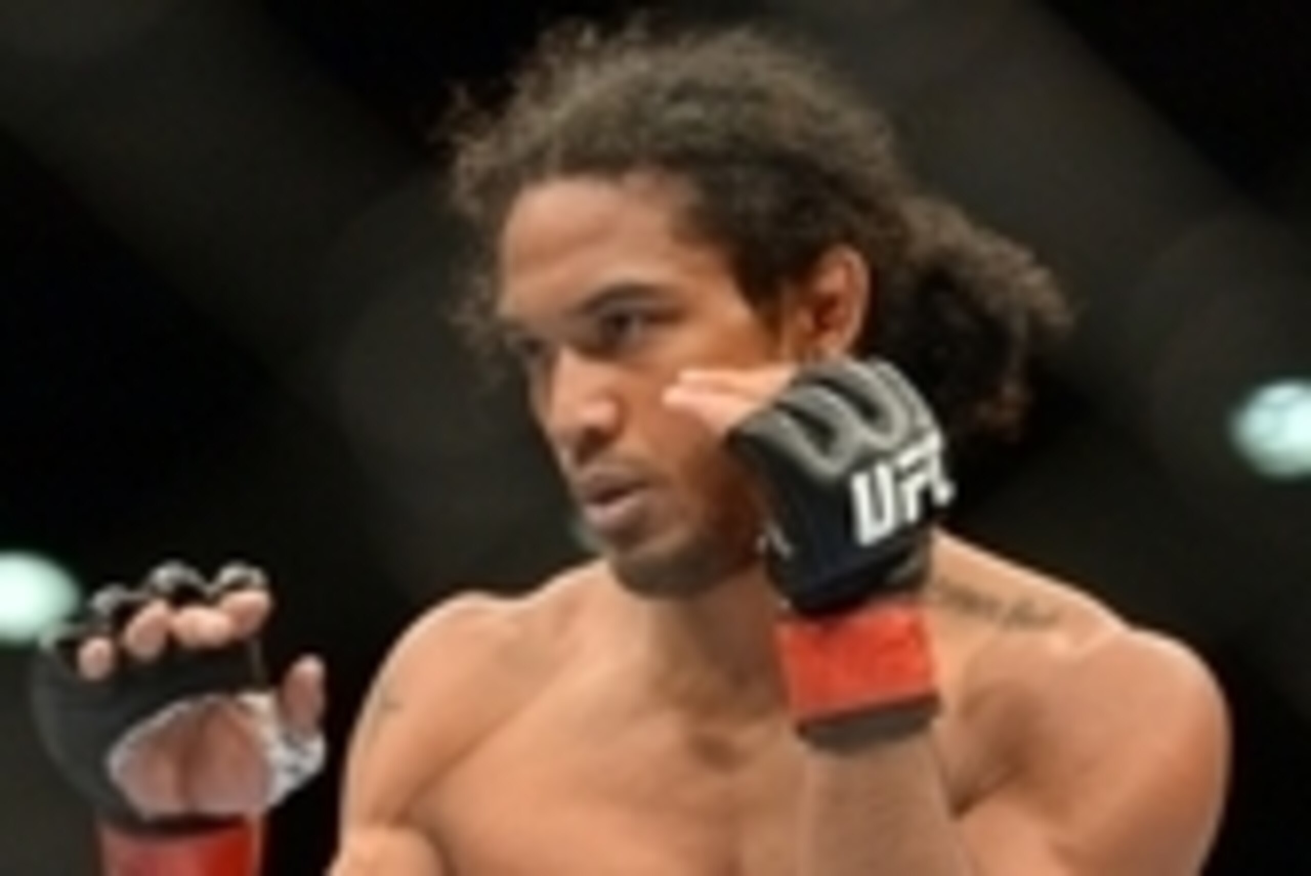 Jun 7, 2014; Albuquerque, NM, USA; Benson Henderson (red) and Rustam Khabilov (blue) fight during their lightweight bout during UFC Fight Night 42 at Tingley Coliseum. Henderson won via fourth round submission. Mandatory Credit: Joe Camporeale-USA TODAY S
