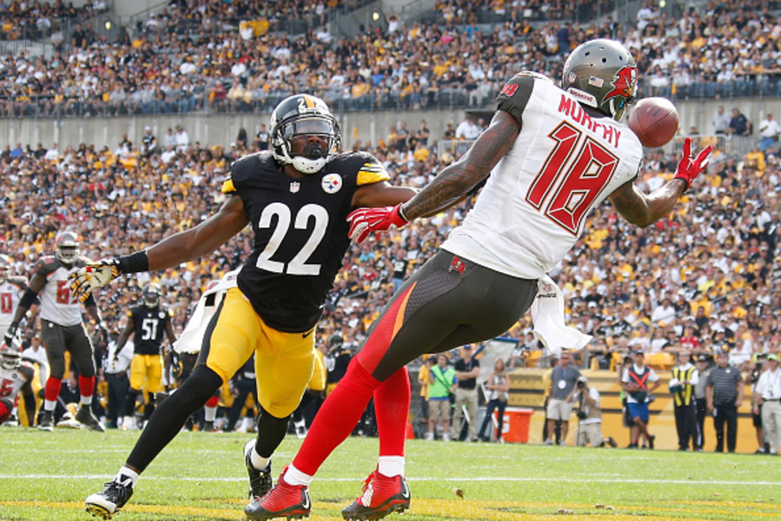 PITTSBURGH, PA - SEPTEMBER 28:  Louis Murphy #18 of the Tampa Bay Buccaneers can't make a catch in front of William Gay #22 of the Pittsburgh Steelers during the fourth quarter at Heinz Field on September 28, 2014 in Pittsburgh, Pennsylvania.  (Photo by G