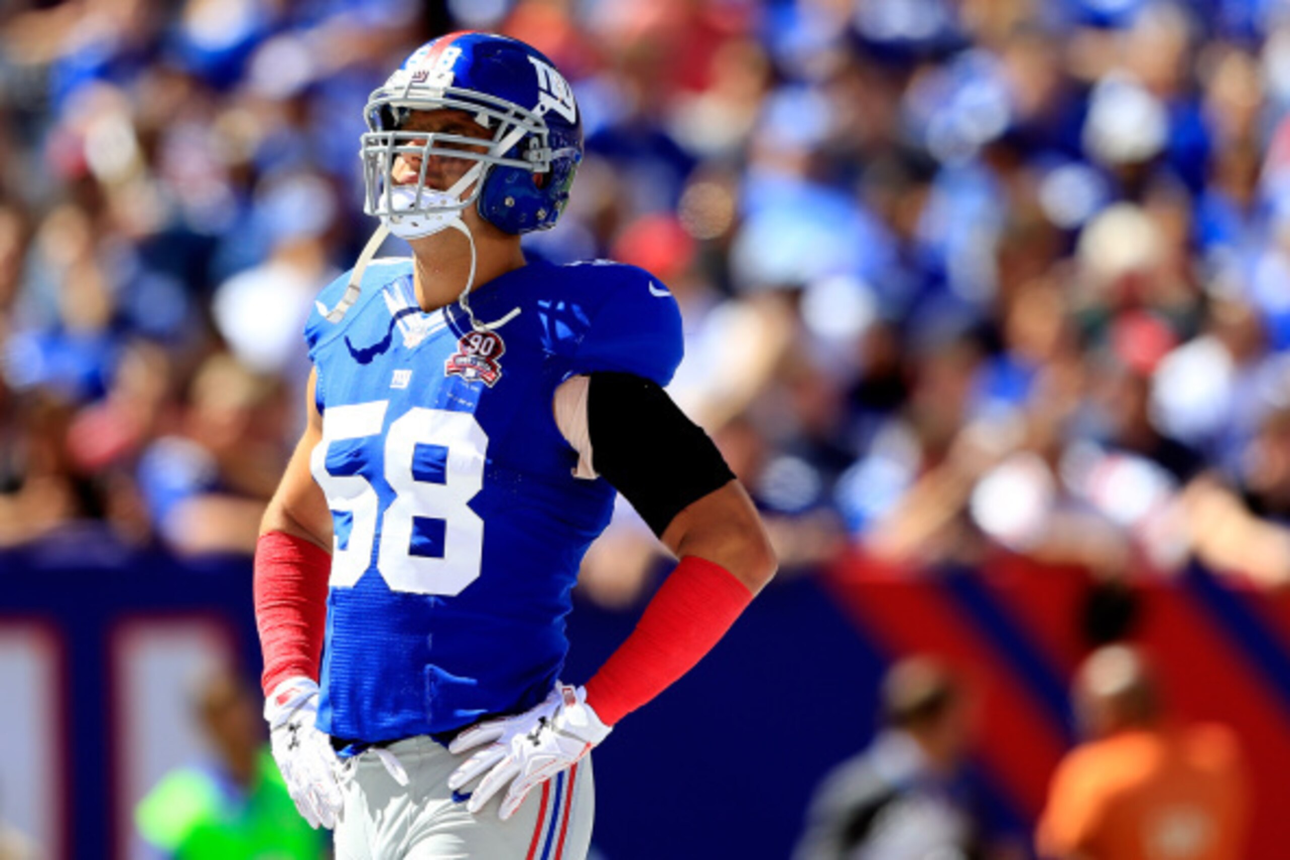 EAST RUTHERFORD, NJ - SEPTEMBER 14: Middle linebacker Mark Herzlich #58 of the New York Giants looks on against the Arizona Cardinals during a game at MetLife Stadium on September 14, 2014 in East Rutherford, New Jersey.  (Photo by Alex Trautwig/Getty Ima