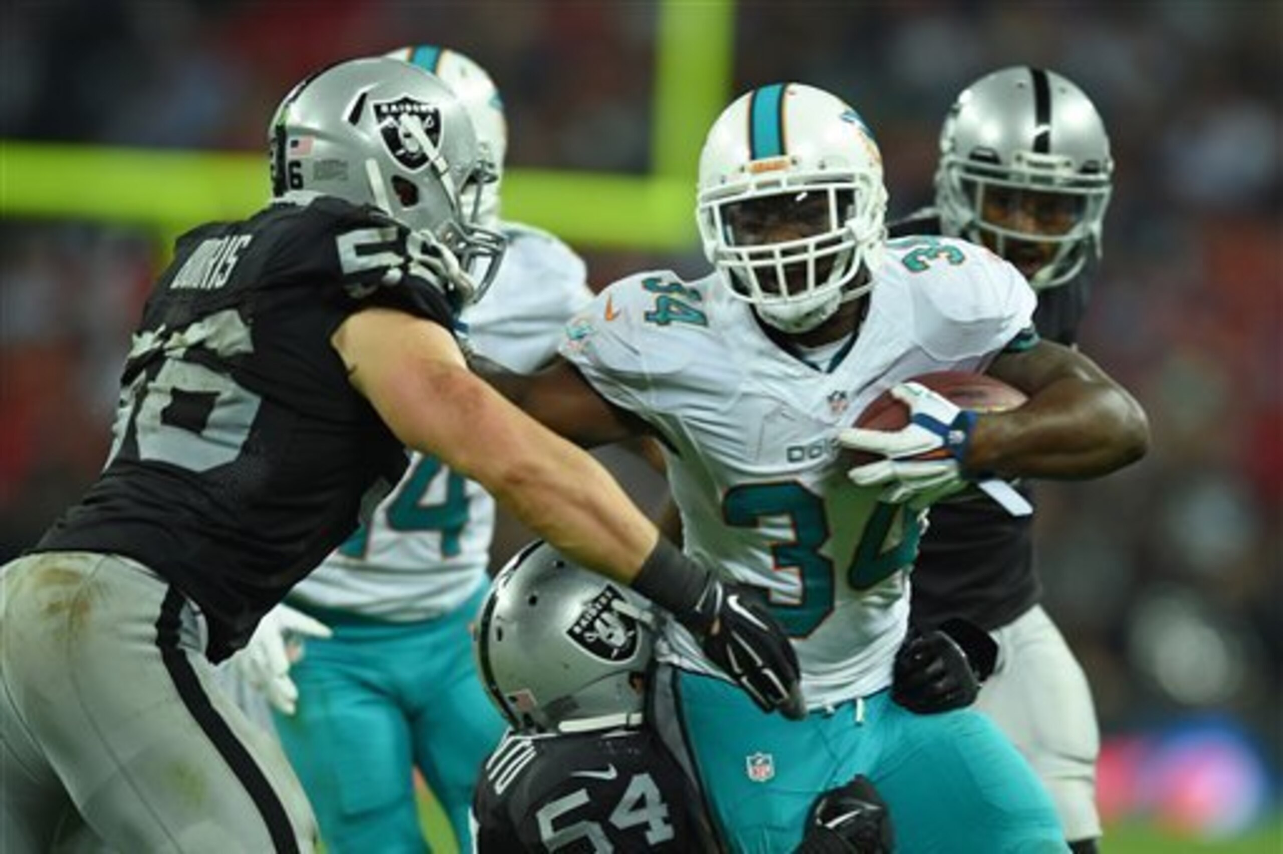The Dolphins' running attack was vicious and effective