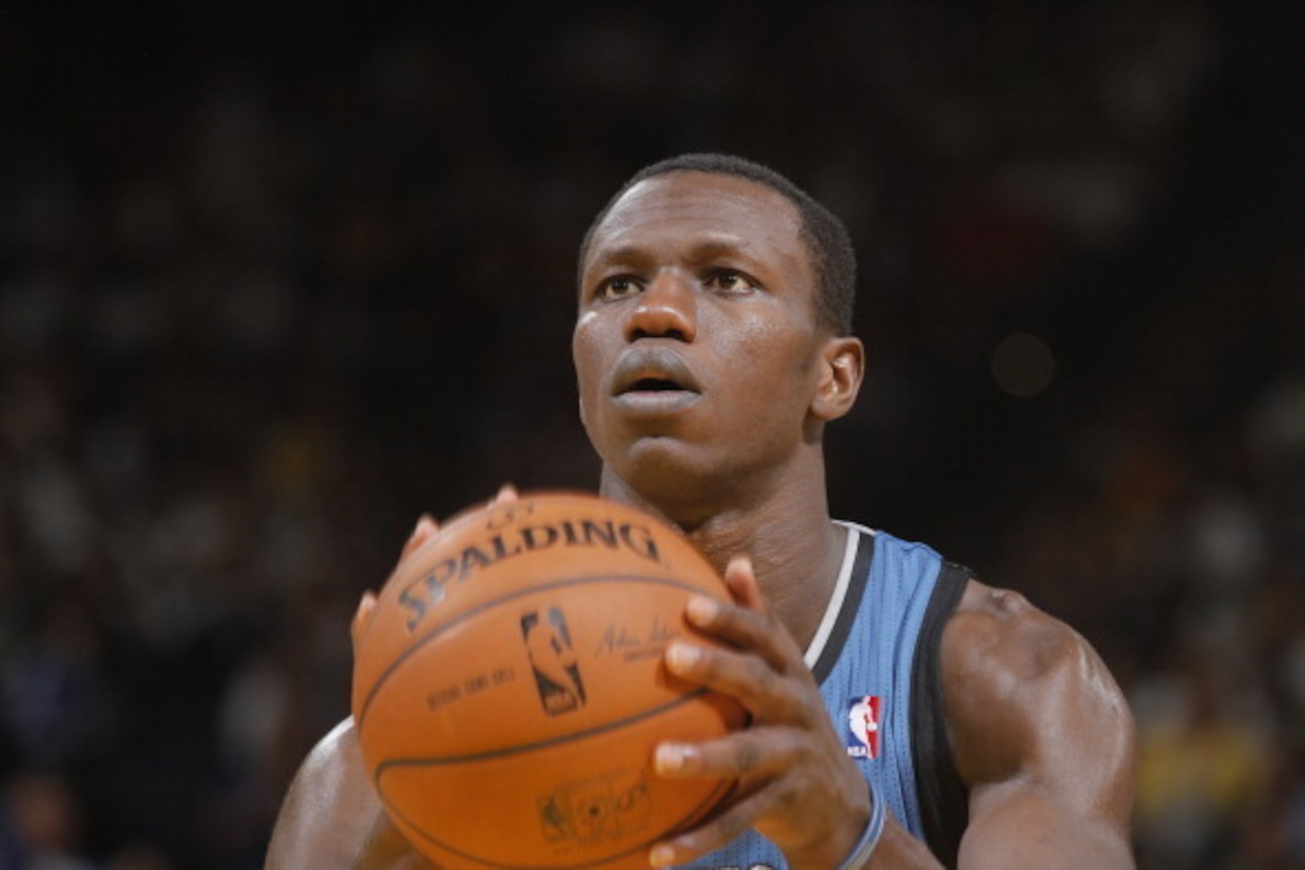 OAKLAND, CA - APRIL 14: Gorgui Dieng #5 of the Minnesota Timberwolves shoots a free throw against the Golden State Warriors on April 14, 2014 at Oracle Arena in Oakland, California. NOTE TO USER: User expressly acknowledges and agrees that, by downloading