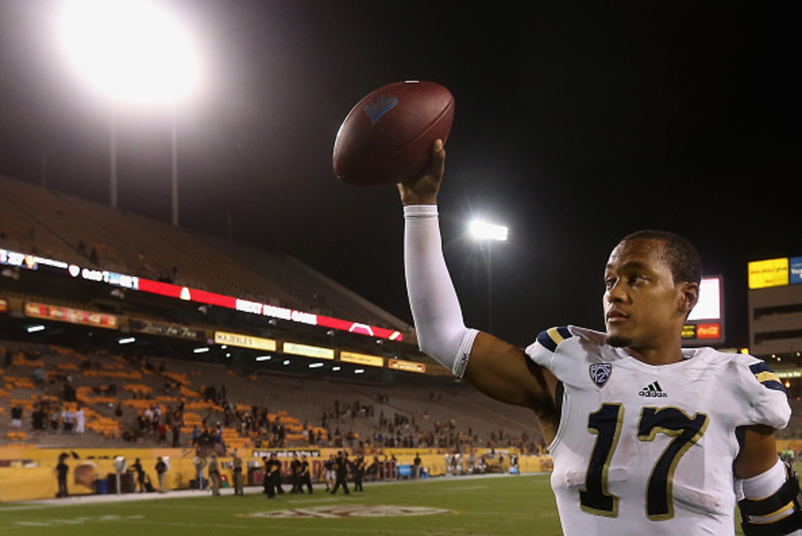 TEMPE, AZ - SEPTEMBER 25: Quarterback Brett Hundley #17 of the UCLA Bruins waves to fans after defeating the Arizona State Sun Devils 62-27 in the college football game at Sun Devil Stadium on September 25, 2014 in Tempe, Arizona. (Photo by Christian Pe TEMPE, AZ - SEPTEMBER 25: Quarterback Brett Hundley #17 of the UCLA Bruins waves to fans after defeating the Arizona State Sun Devils 62-27 in the college football game at Sun Devil Stadium on September 25, 2014 in Tempe, Arizona. (Photo by Christian Pe
