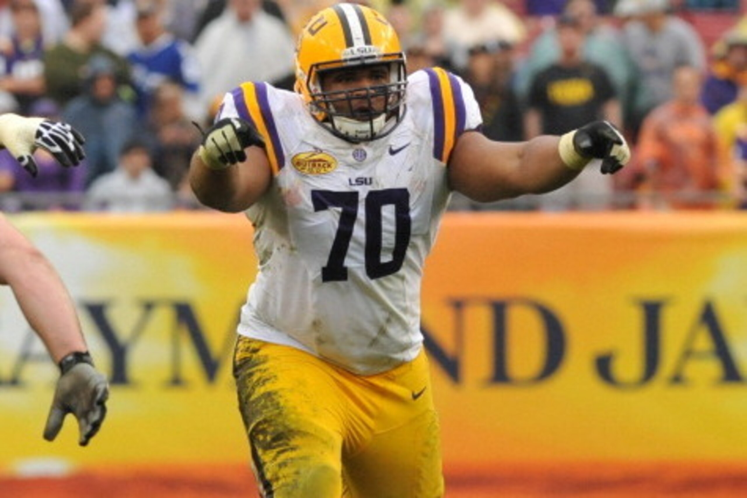 TAMPA, FL - JANUARY 1: Tackle Lael Collins #70 of the LSU Tigers sets for play against the Iowa Hawkeyes January 1, 2014 in the Outback Bowl at Raymond James Stadium in Tampa, Florida. LSU won 21 - 14. (Photo by Al Messerschmidt/Getty Images) TAMPA, FL - JANUARY 1: Tackle Lael Collins #70 of the LSU Tigers sets for play against the Iowa Hawkeyes January 1, 2014 in the Outback Bowl at Raymond James Stadium in Tampa, Florida. LSU won 21 - 14. (Photo by Al Messerschmidt/Getty Images)