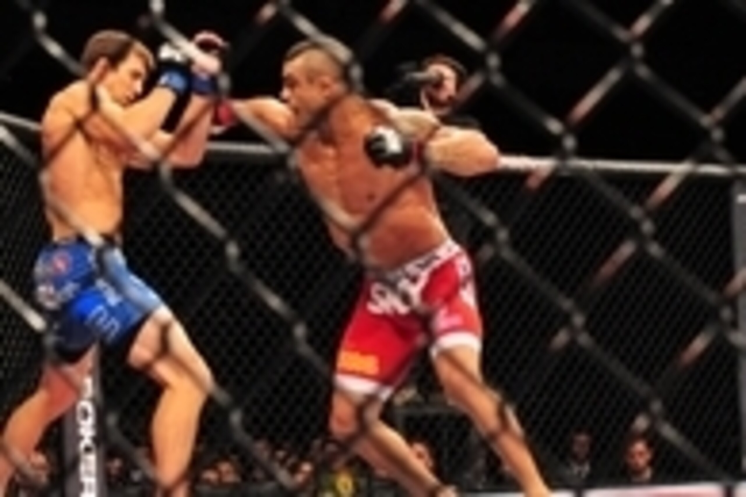 May 18, 2013; Jaragua do Sul, BRAZIL; Luke Rockhold (blue shorts) fights against Vitor Belfort (red shorts) during UFC on FX 8 at ARena Jaragua. Mandatory Credit: Jason da Silva-USA TODAY Sports