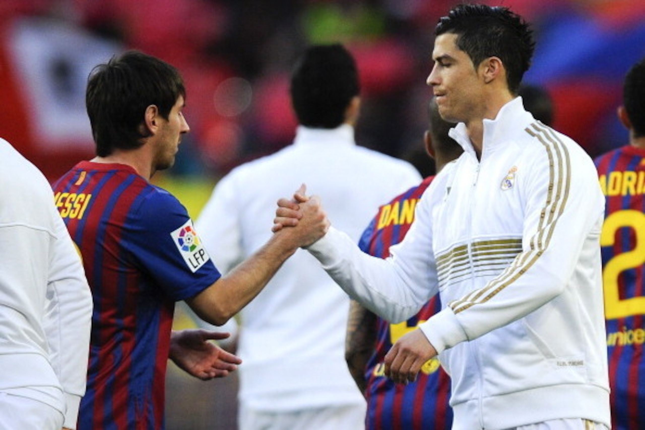 BARCELONA, SPAIN - APRIL 21: Lionel Messi of FC Barcelona (L) and Cristiano Ronaldo of Real Madrid CF shake hands prior to the La Liga match between FC Barcelona and Real Madrid at Camp Nou on April 21, 2012 in Barcelona, Spain. Real Madrid CF won 1-2. BARCELONA, SPAIN - APRIL 21: Lionel Messi of FC Barcelona (L) and Cristiano Ronaldo of Real Madrid CF shake hands prior to the La Liga match between FC Barcelona and Real Madrid at Camp Nou on April 21, 2012 in Barcelona, Spain. Real Madrid CF won 1-2.
