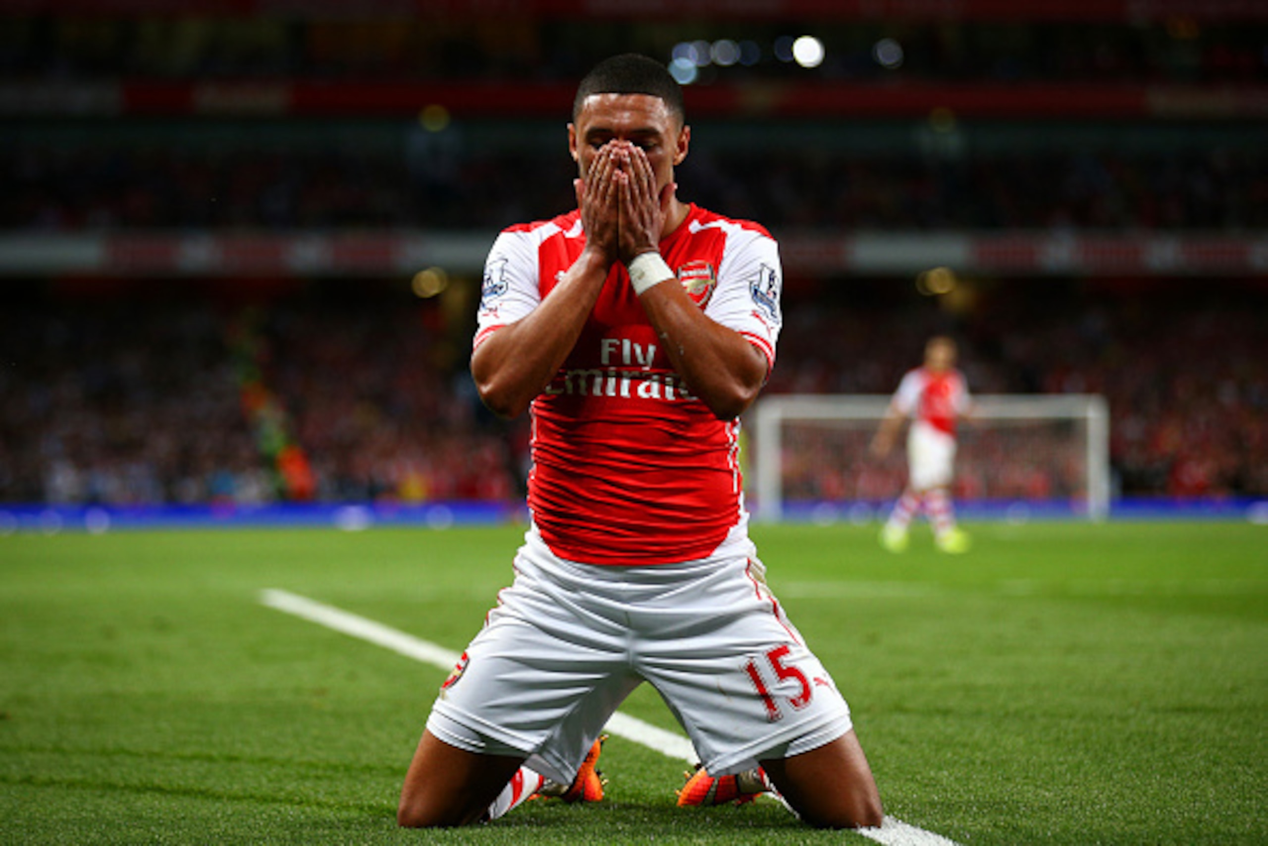 LONDON, ENGLAND - SEPTEMBER 27:  Alex Oxlade-Chamberlain of Arsenal reacts after a missed opportunity during the Barclays Premier League match between Arsenal and Tottenham Hotspur at Emirates Stadium on September 27, 2014 in London, England.  (Photo by P