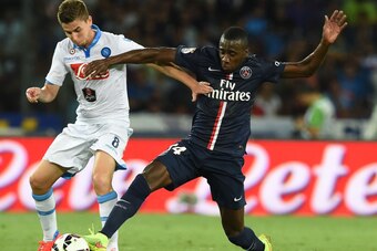 NAPLES, ITALY - AUGUST 11:  Jorginho of Napoli and Blaise Matuidi of Paris Saint Germain in action during the pre-season friendly match between SSC Napoli and Paris Saint-Germain FC at Stadio San Paolo on August 11, 2014 in Naples, Italy.  (Photo by Giuse