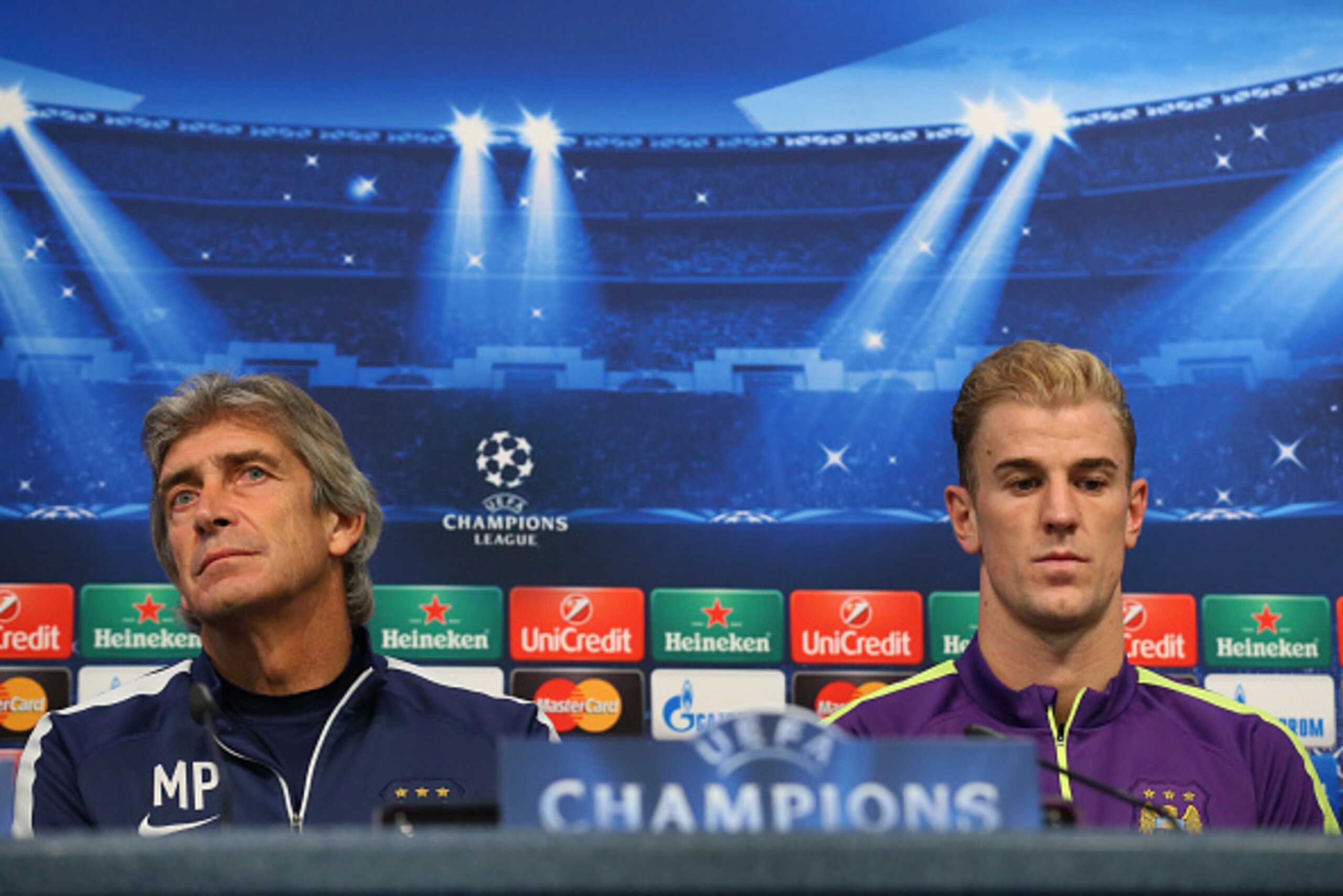 MANCHESTER, ENGLAND - SEPTEMBER 29:  Manuel Pellegrini the manager of Manchester City and Joe Hart face the media during a press conference at the Etihad Stadium on September 29, 2014 in Manchester, England.  (Photo by Alex Livesey/Getty Images)