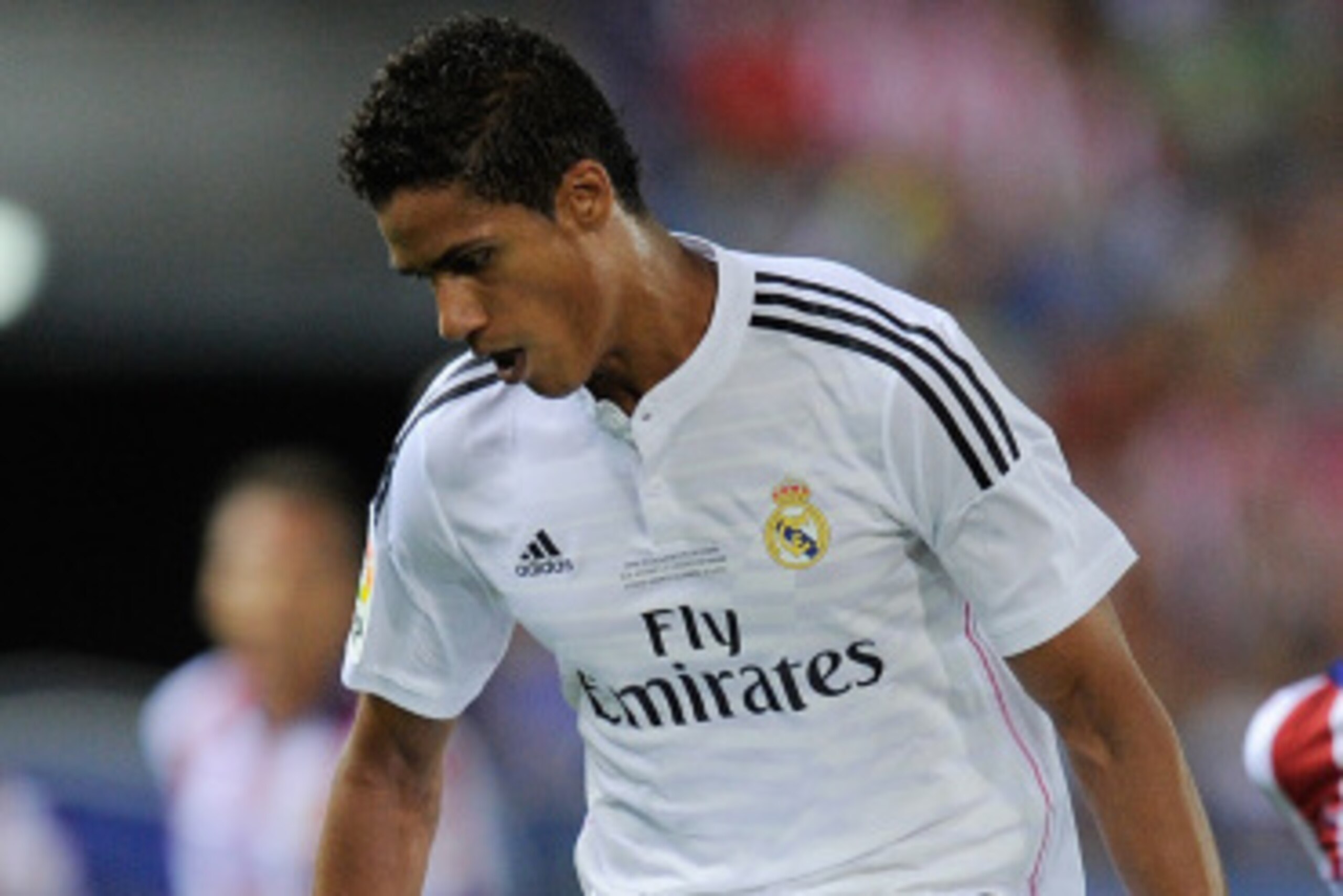 MADRID, SPAIN - AUGUST 22:  Raphael Varane of Real Madrid in action during the Supercopa, second leg match between Club Atletico de Madrid and Real Madrid at Vicente Caldron stadium on August 22, 2014 in Madrid, Spain.  (Photo by Denis Doyle/Getty Images)