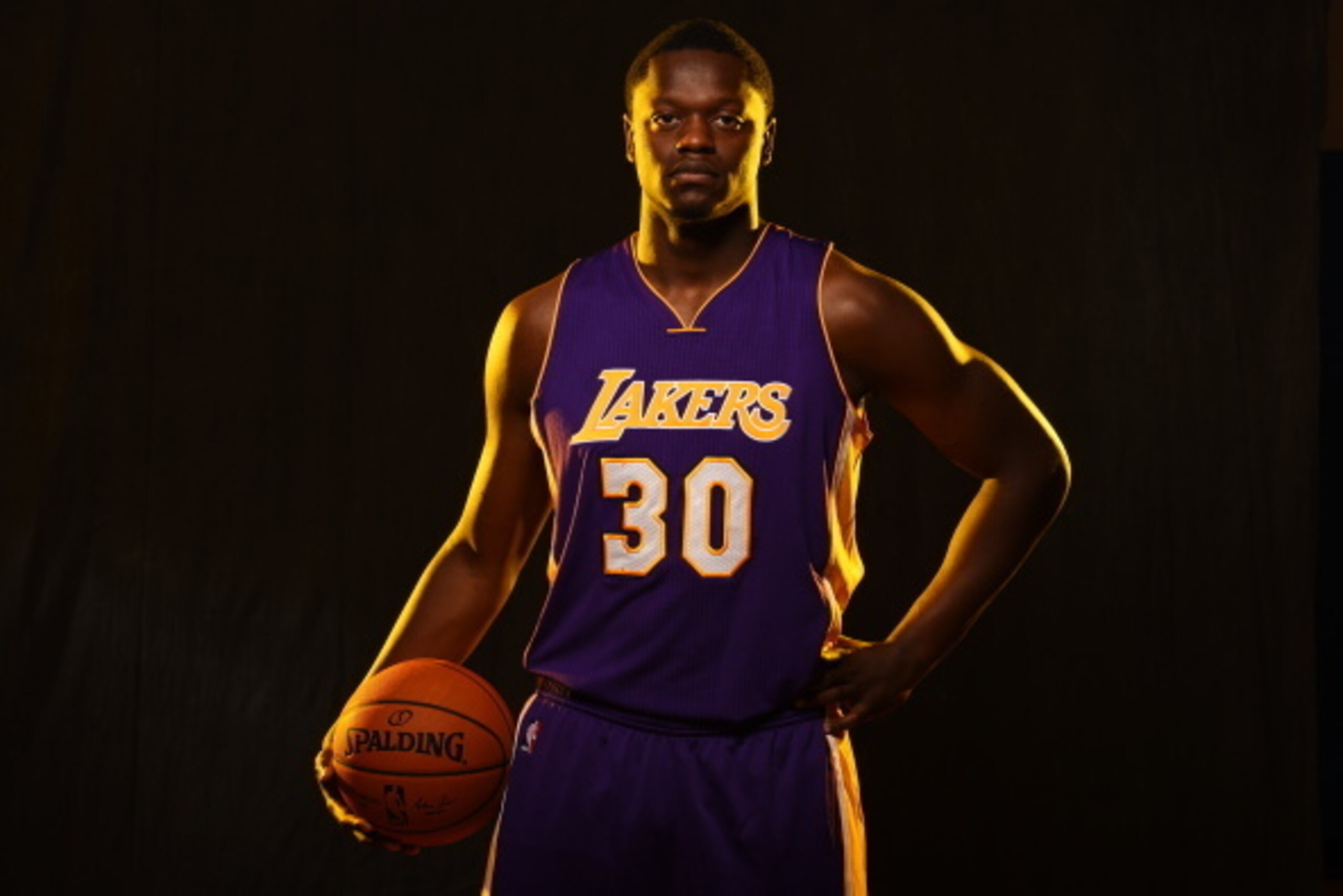 TARRYTOWN, NY - AUGUST 3:  Julius Randle #30 of the Los Angeles Lakers poses for a portrait during the 2014 NBA rookie photo shoot on August 3, 2014 at the Madison Square Garden Training Facility in Tarrytown, New York. NOTE TO USER: User expressly acknow