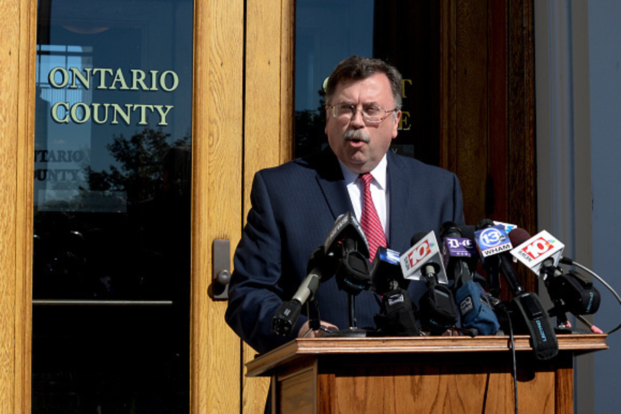 CANANDAIGUA, NY - SEPTEMBER 24:  Ontario County District Attorney Michael Tantillo holds a press conference in regards to the death of racecar driver Kevin Ward Jr. outside Ontario County Court on September 24, 2014 in Canandaigua, New York. According to 