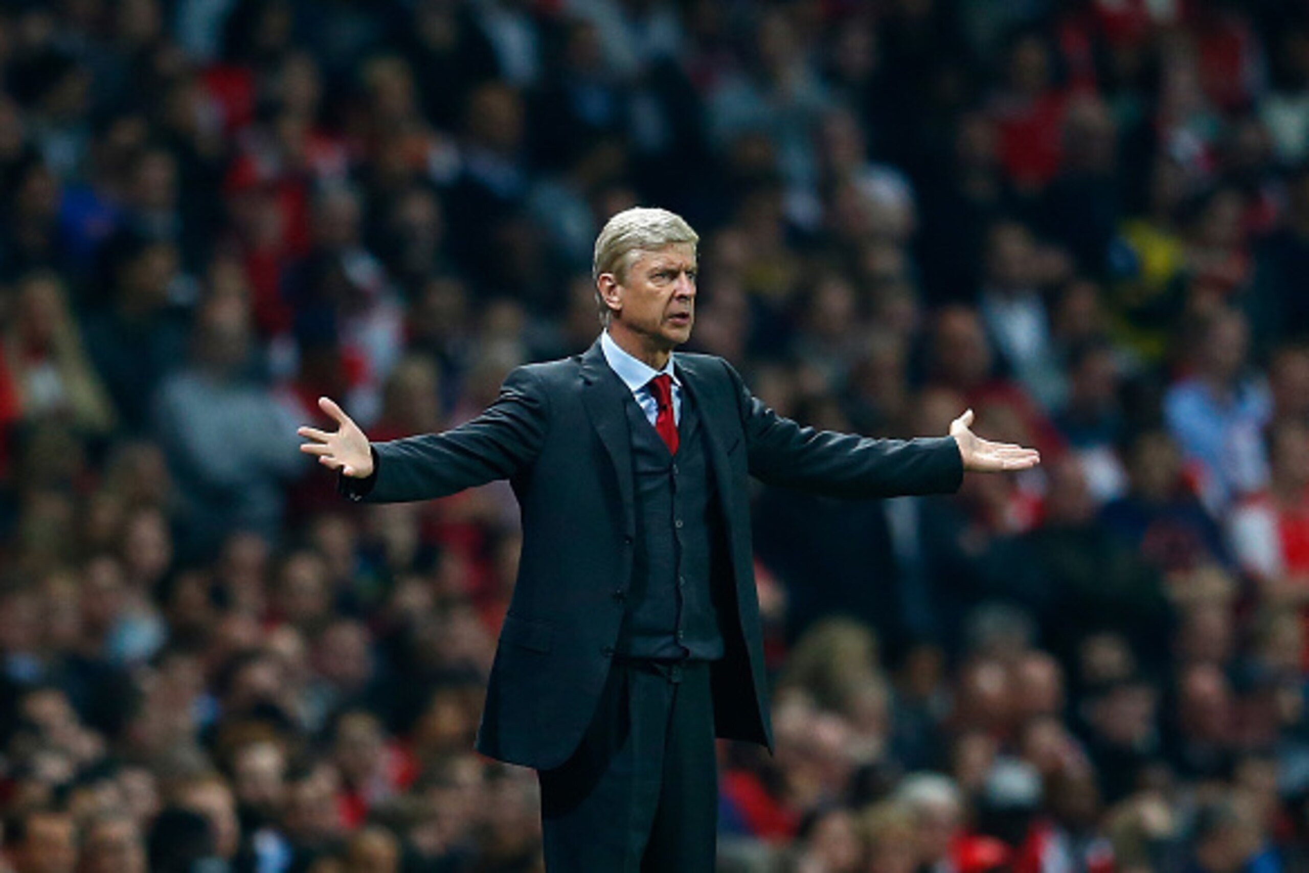 LONDON, ENGLAND - SEPTEMBER 23:  Manager of Arsenal, Arsene Wenger reacts during the Capital One Cup Third Round match between Arsenal and Southampton at the Emirates Stadium on September 23, 2014 in London, England.  (Photo by Julian Finney/Getty Images)
