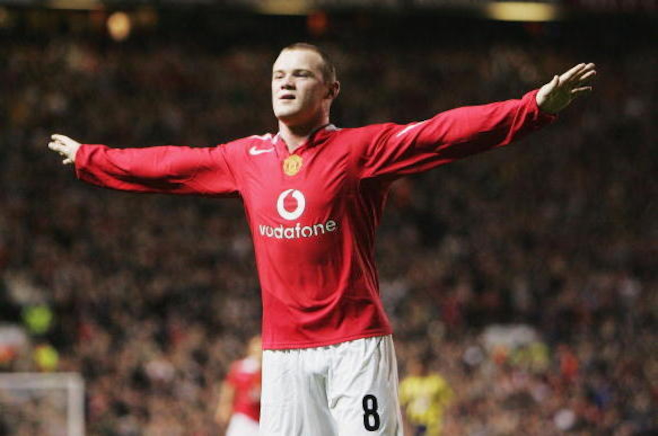 MANCHESTER, ENGLAND - SEPTEMBER 28:  Wayne Rooney of Manchester United celebrates his second goal during the UEFA Champions League Group D match between Manchester United and Fenerbahce SK at Old Trafford on September 28, 2004 in Manchester, England.  (Ph