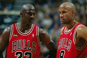 SALT LAKE CITY - JUNE 14:  Michael Jordan #23 and Ron Harper #9 of the Chicago Bulls look on during game six of the 1998 NBA Finals against the Utah Jazz on June 14, 1998 in Salt Lake City, Utah.  NOTE TO USER: User expressly acknowledges and agrees that,