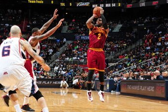 ATLANTA, GA - APRIL 4: Kyrie Irving #2 of the Cleveland Cavaliers shoots the ball during the game against the Atlanta Hawks on April 4, 2014 at Philips Arena in Atlanta, Georgia.  NOTE TO USER: User expressly acknowledges and agrees that, by downloading a
