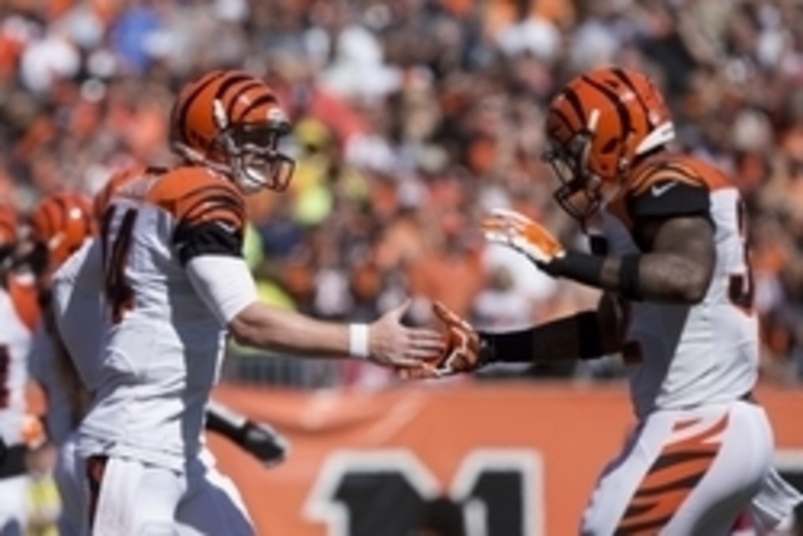 Sep 14, 2014; Cincinnati, OH, USA; Cincinnati Bengals quarterback Andy Dalton (14) celebrates with running back Jeremy Hill (32) against the Atlanta Falcons at Paul Brown Stadium. The Bengals won 24-10. Mandatory Credit: Aaron Doster-USA TODAY Sports Sep 14, 2014; Cincinnati, OH, USA; Cincinnati Bengals quarterback Andy Dalton (14) celebrates with running back Jeremy Hill (32) against the Atlanta Falcons at Paul Brown Stadium. The Bengals won 24-10. Mandatory Credit: Aaron Doster-USA TODAY Sports