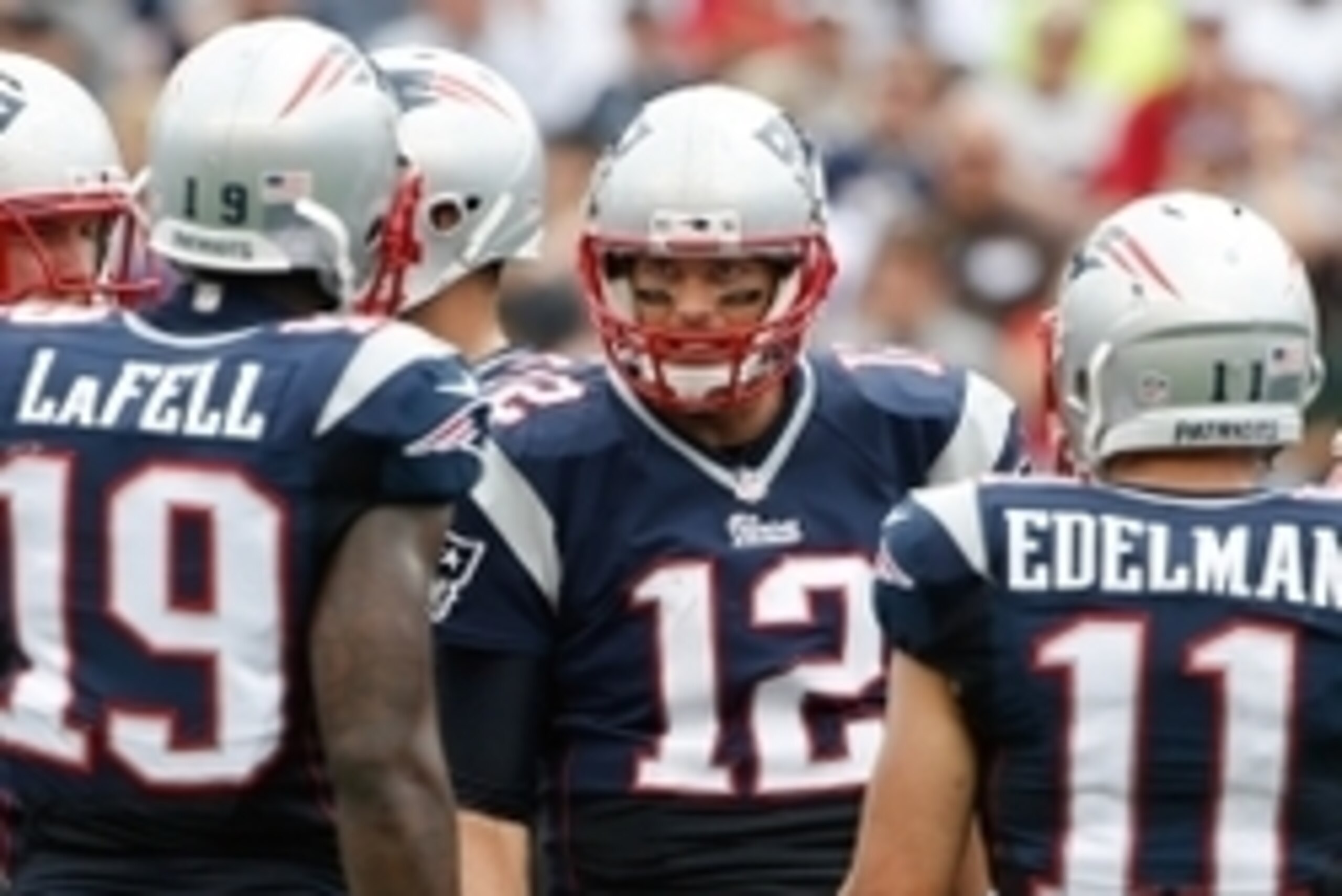 Sep 21, 2014; Foxborough, MA, USA; New England Patriots quarterback Tom Brady (12) in the huddle during the second quarter against the Oakland Raiders at Gillette Stadium. Mandatory Credit: Winslow Townson-USA TODAY Sports Sep 21, 2014; Foxborough, MA, USA; New England Patriots quarterback Tom Brady (12) in the huddle during the second quarter against the Oakland Raiders at Gillette Stadium. Mandatory Credit: Winslow Townson-USA TODAY Sports