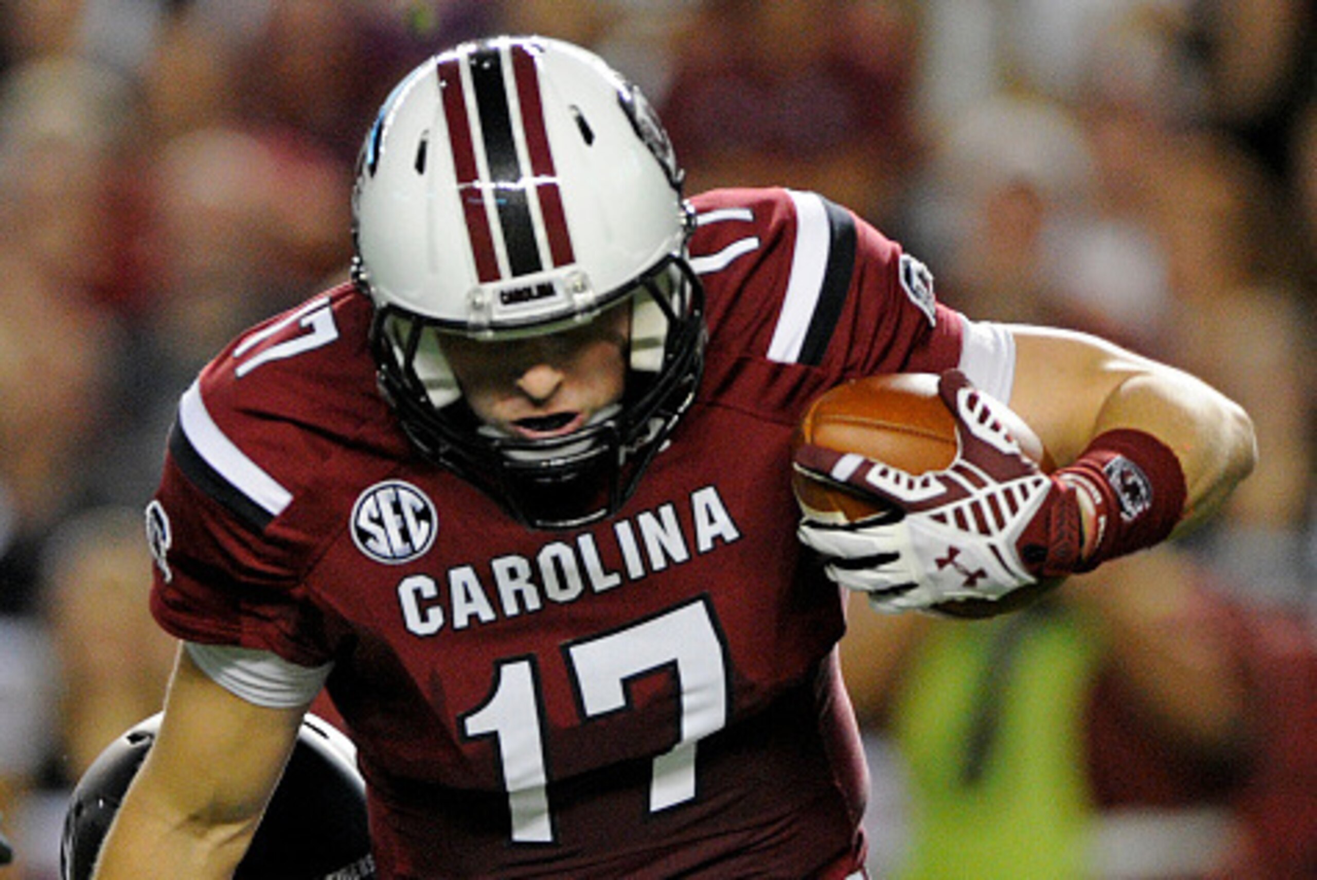 COLUMBIA, SC - SEPTEMBER 27:   Quarterback Dylan Thompson #17 of the South Carolina Gamecocks is brought down by defensive lineman Matt Hoch #89 of the Missouri Tigers during the second quarter on September 27, 2014 at Williams-Brice Stadium in Columbia, 