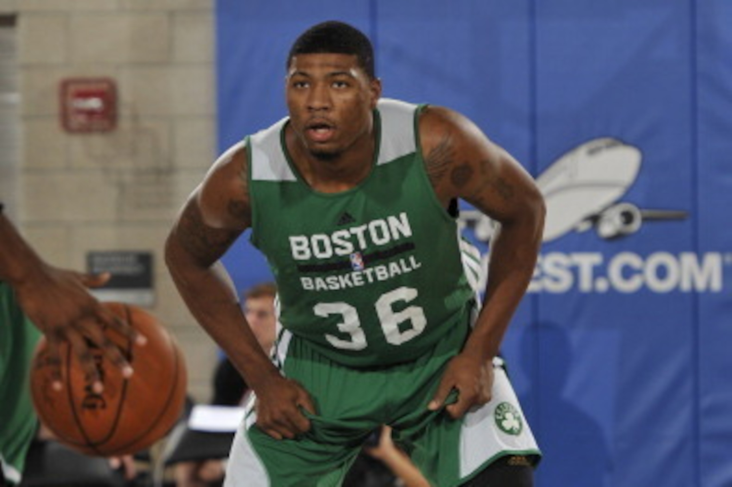 ORLANDO, FL - JULY 10: Marcus Smart #36 of the Boston Celtics defends against the Orlando Magic during the Samsung NBA Summer League 2014 on July 10, 2014 at Amway Center in Orlando, Florida. NOTE TO USER: User expressly acknowledges and agrees that, by d ORLANDO, FL - JULY 10: Marcus Smart #36 of the Boston Celtics defends against the Orlando Magic during the Samsung NBA Summer League 2014 on July 10, 2014 at Amway Center in Orlando, Florida. NOTE TO USER: User expressly acknowledges and agrees that, by d