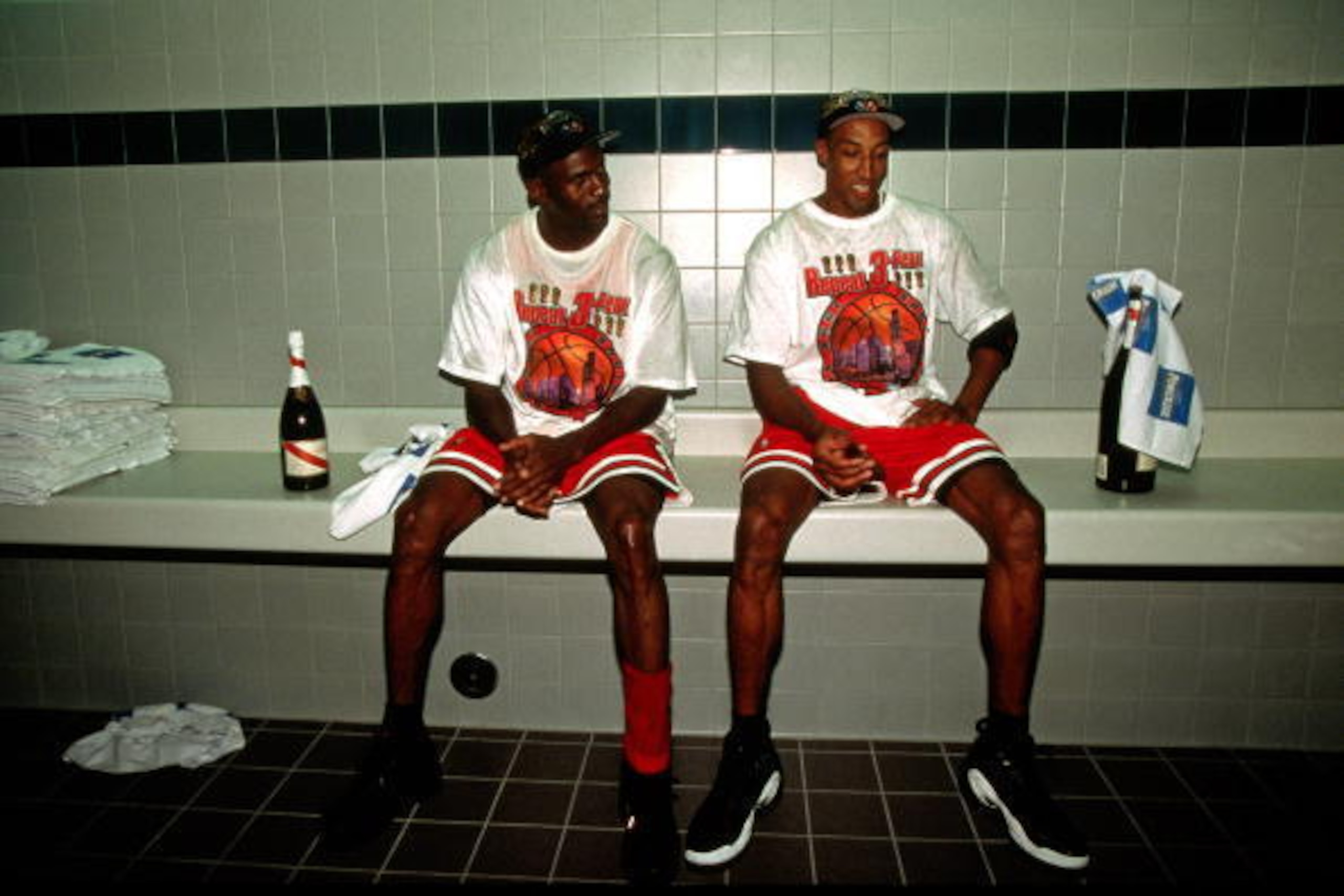 SALT LAKE CITY - JUNE 14:  Michael Jordan #23 and Scottie Pippen #33 of the Chicago Bulls celebrate in the locker room after winning the 1998 NBA Championship against the Utah Jazz on June 14, 1998 in Salt Lake City, Utah.  NOTE TO USER: User expressly ac