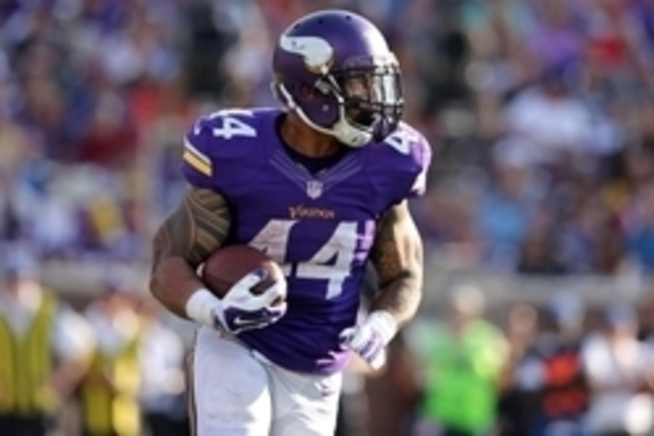 Sep 28, 2014; Minneapolis, MN, USA; Minnesota Vikings running back Matt Asiata (44) carries the ball during the second quarter against the Atlanta Falcons at TCF Bank Stadium. The Vikings defeated the Falcons 41-28. Mandatory Credit: Brace Hemmelgarn-USA 