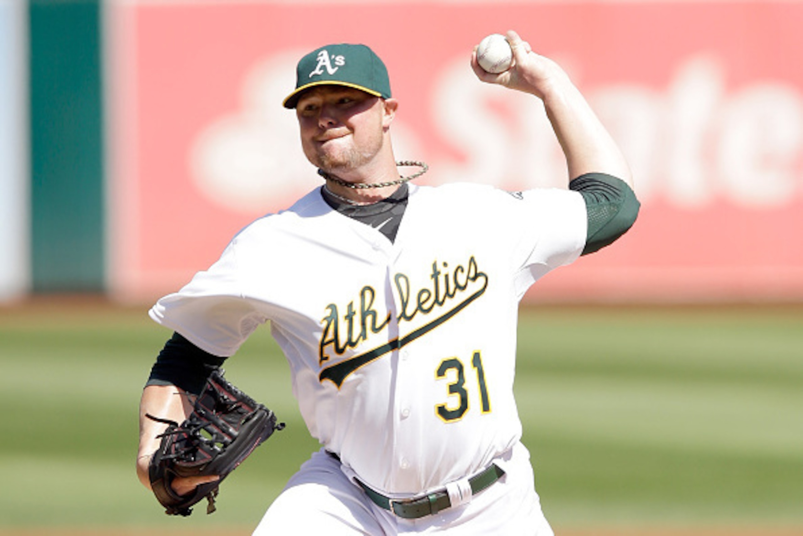 OAKLAND, CA - SEPTEMBER 24:  Jon Lester #31 of the Oakland Athletics pitches against the Los Angeles Angels of Anaheim at O.co Coliseum on September 24, 2014 in Oakland, California.  (Photo by Ezra Shaw/Getty Images)