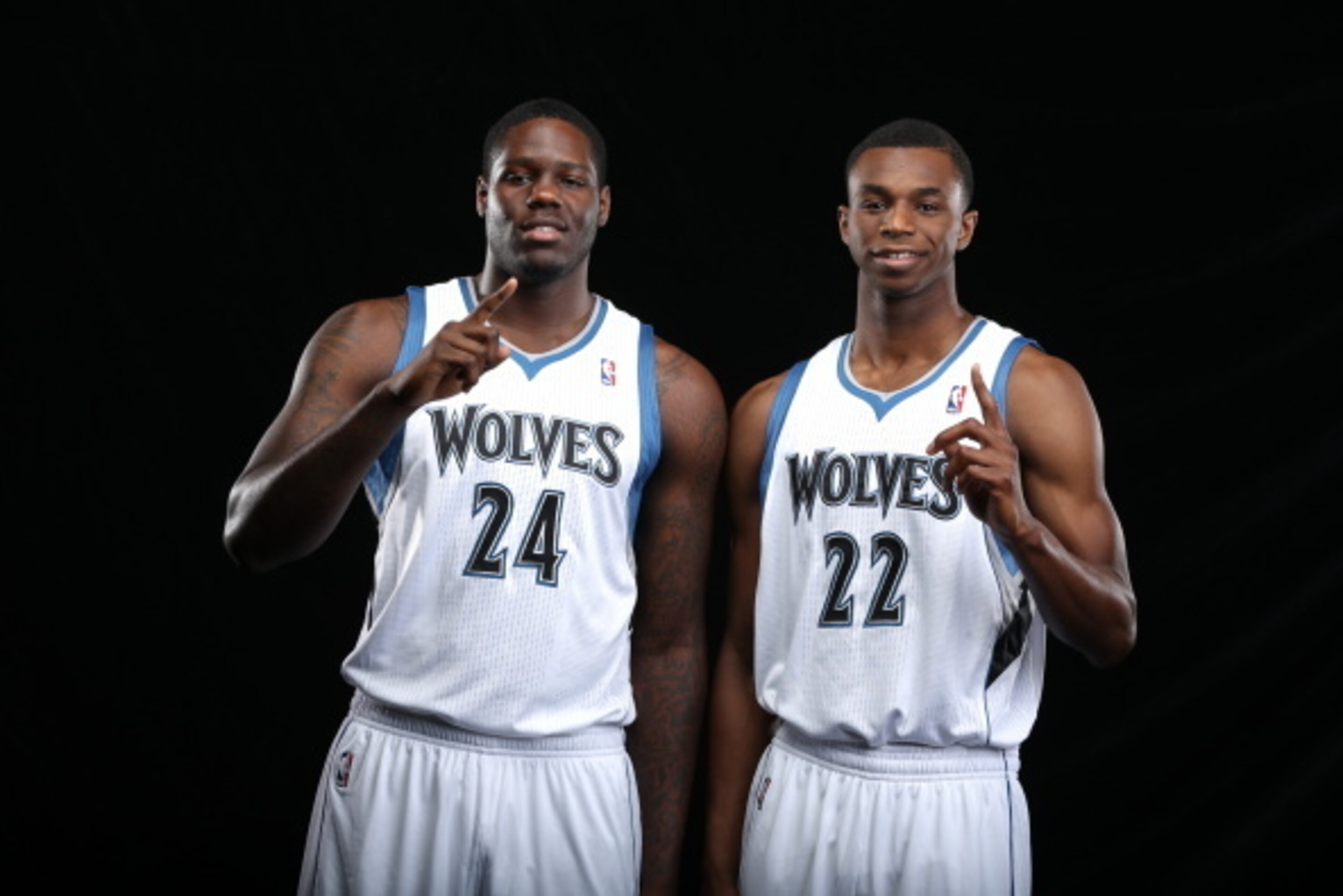MINNEAPOLIS, MN - AUGUST 26:  Anthony Bennett #24 and Andrew Wiggins #22 of the Minnesota Timberwolves pose for portraits on August 26, 2014 at Target Center in Minneapolis, Minnesota.  NOTE TO USER: User expressly acknowledges and agrees that, by downloa