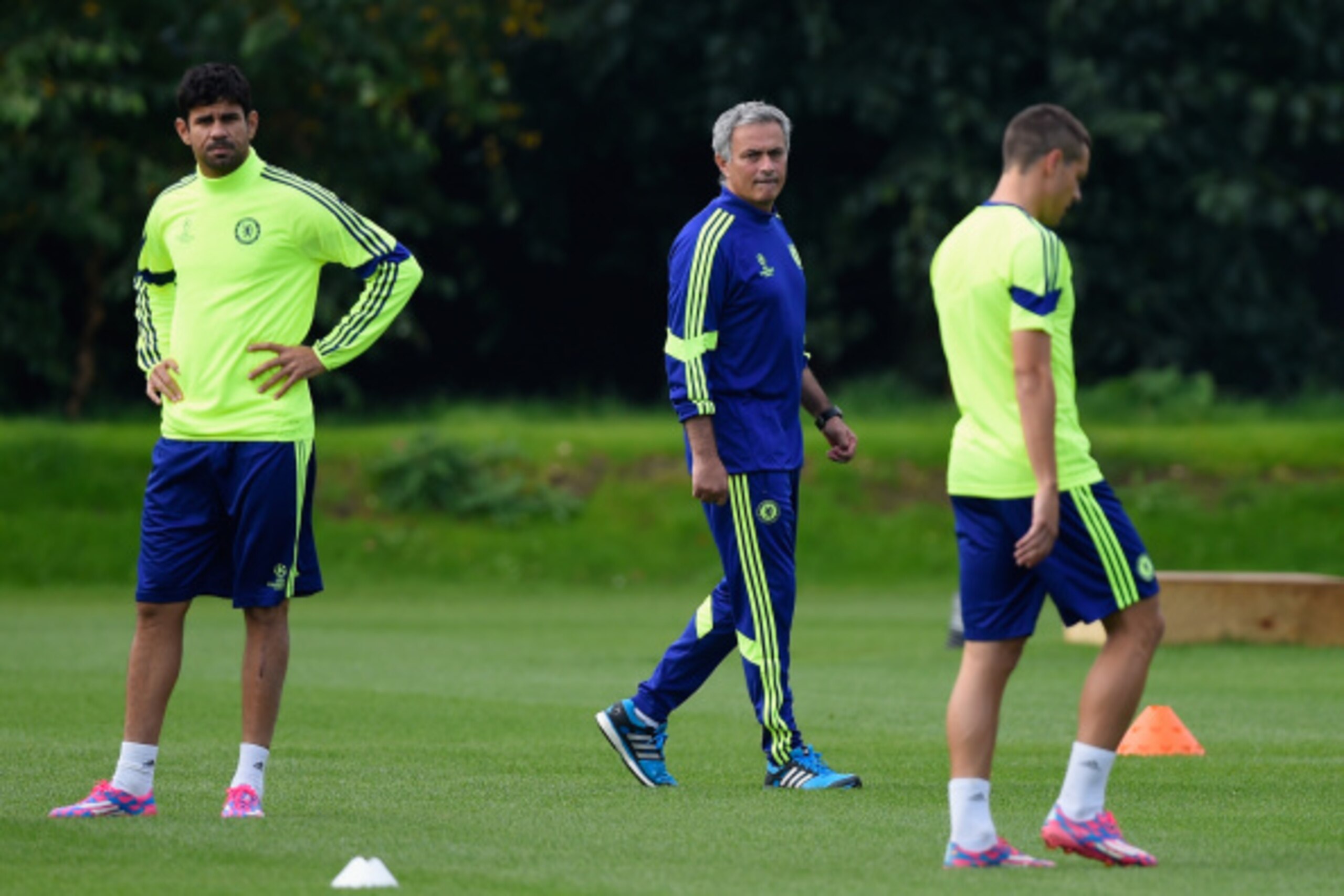 COBHAM, ENGLAND - SEPTEMBER 16:  Diego Costa and manager Jose Mourinho of Chelsea look on during a Chelsea training session at the Chelsea training ground on September 16, 2014 in Cobham, United Kingdom.  (Photo by Mike Hewitt/Getty Images)